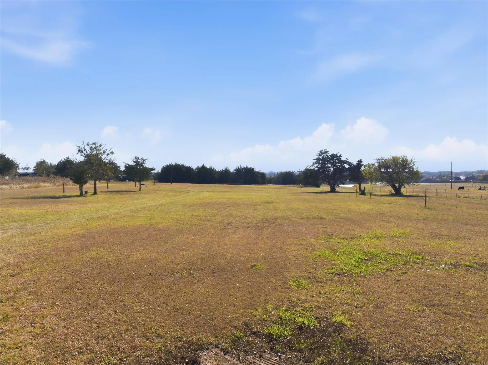 View of green lawn featuring a view of rural / pastoral area
