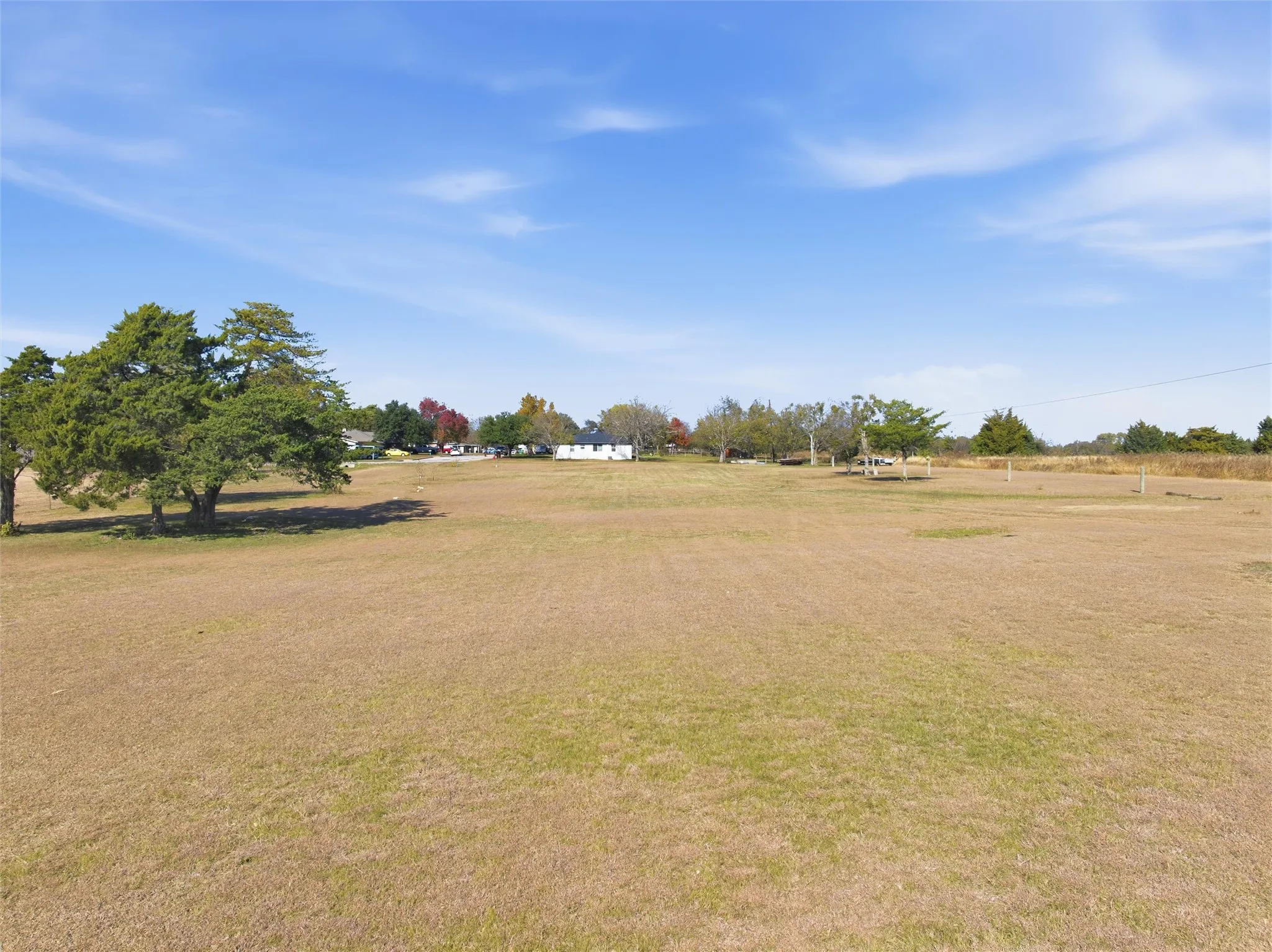 View of green lawn with a view of rural / pastoral area