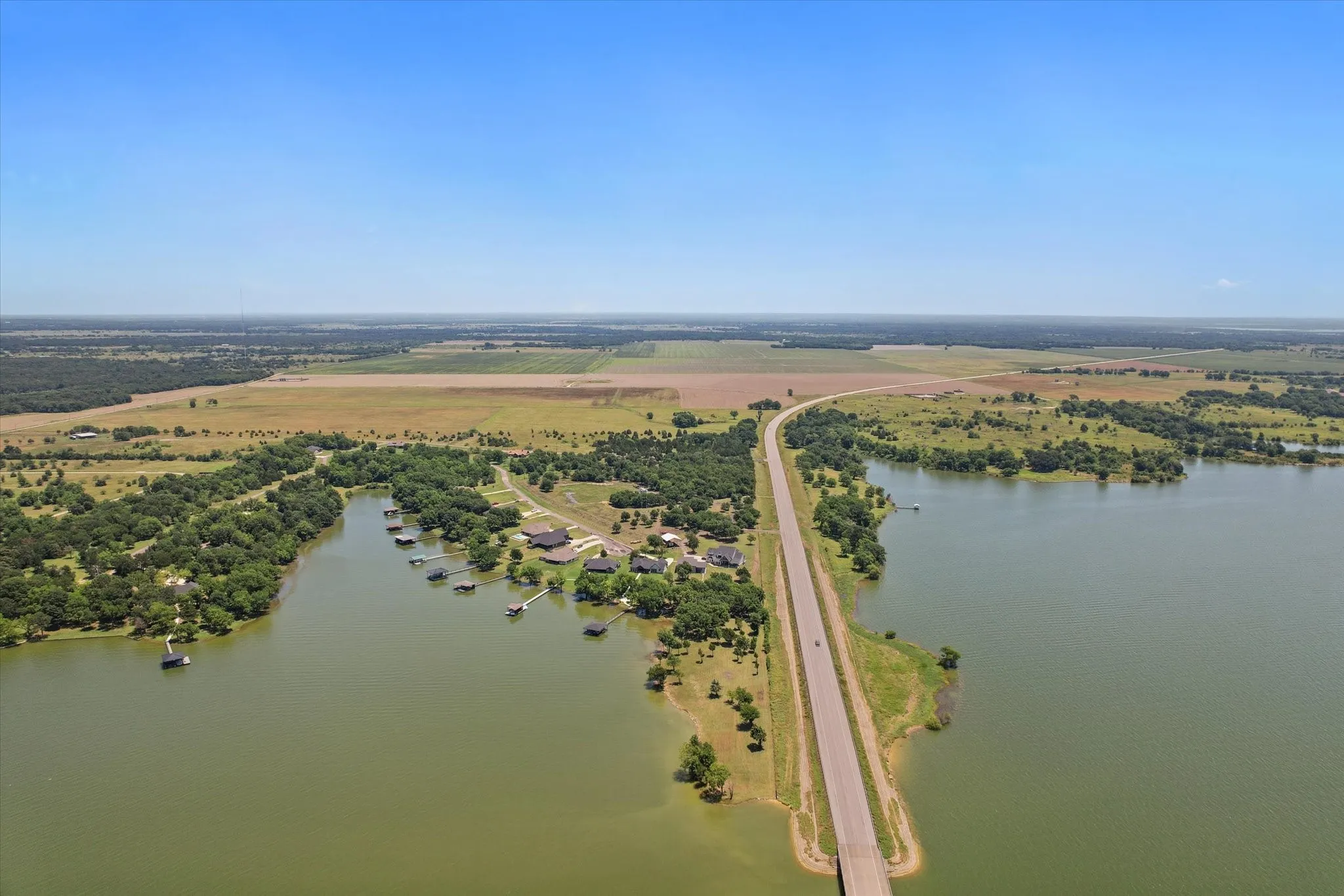 Overview of rural landscape with a nearby body of water
