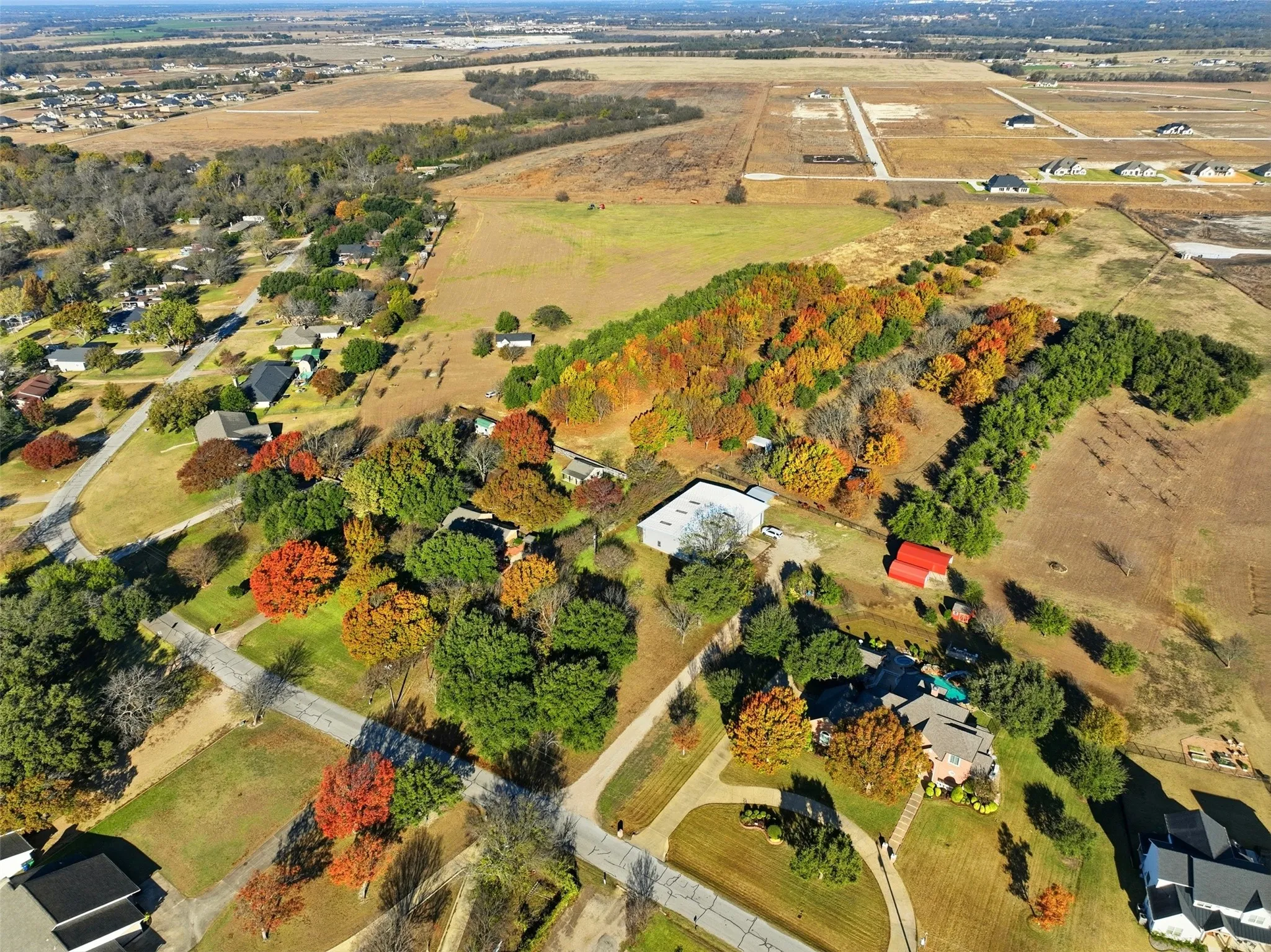 Aerial view of property's location with rural landscape