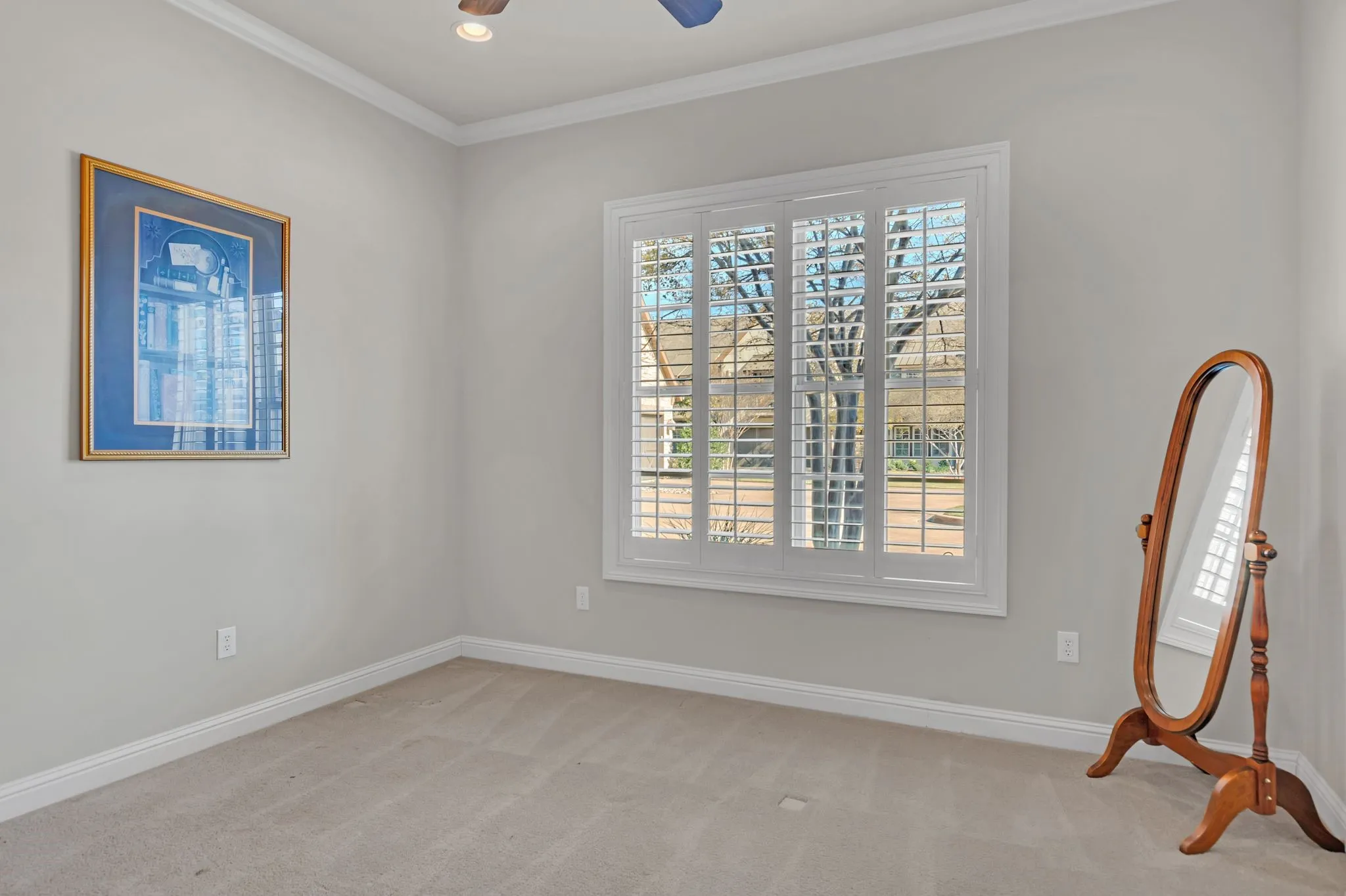 2nd Bedroom, featuring light colored carpet, crown molding, healthy amount of natural light, ceiling fan, and recessed lighting