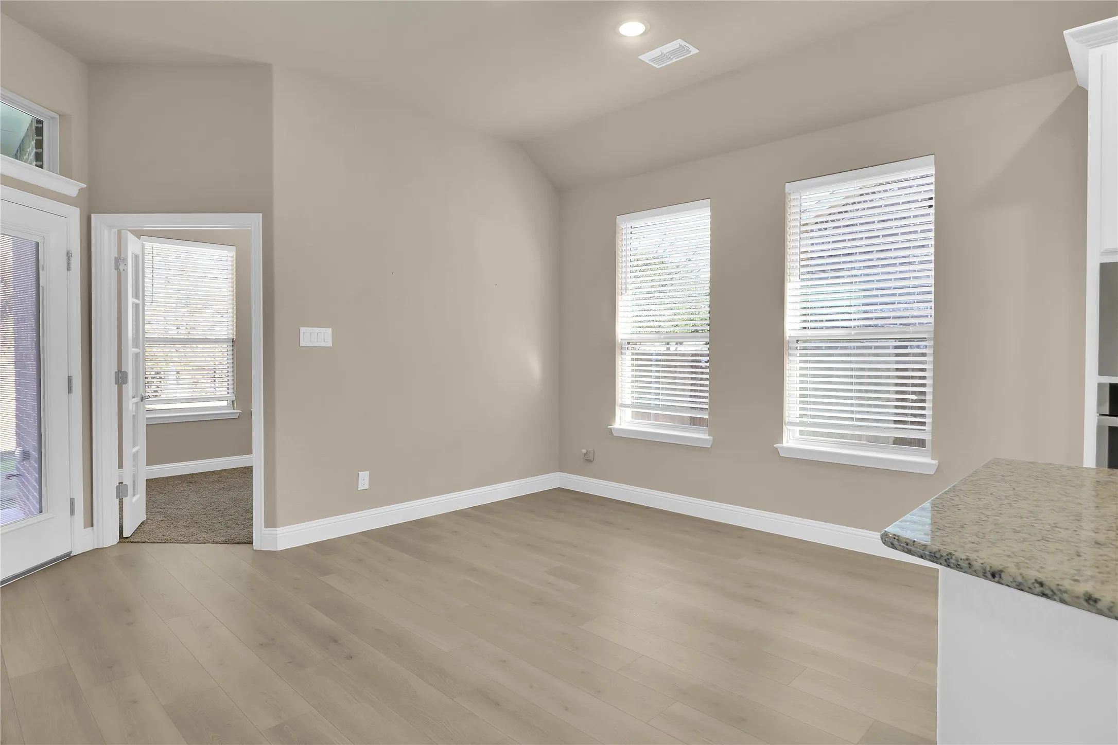 Dining area is open with living and kitchen
