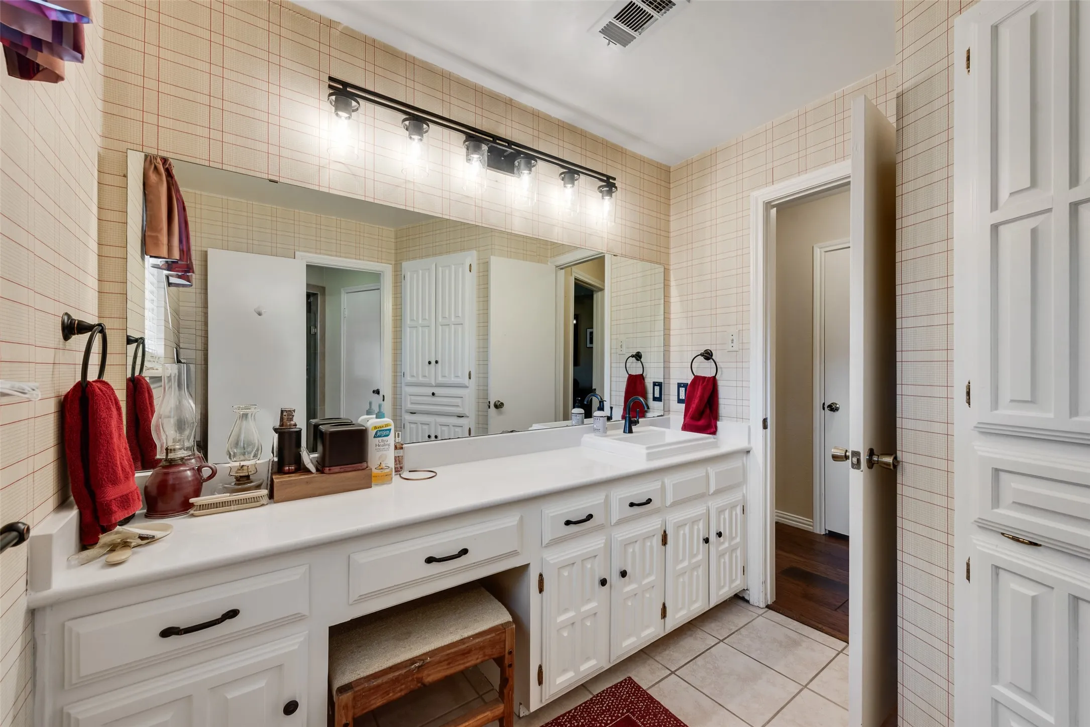 Downstairs full bathroom adjoined to second bedroom.
