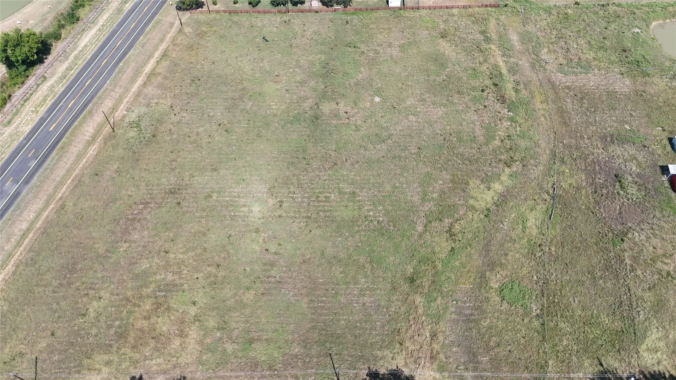 Expansive lot with direct road frontage