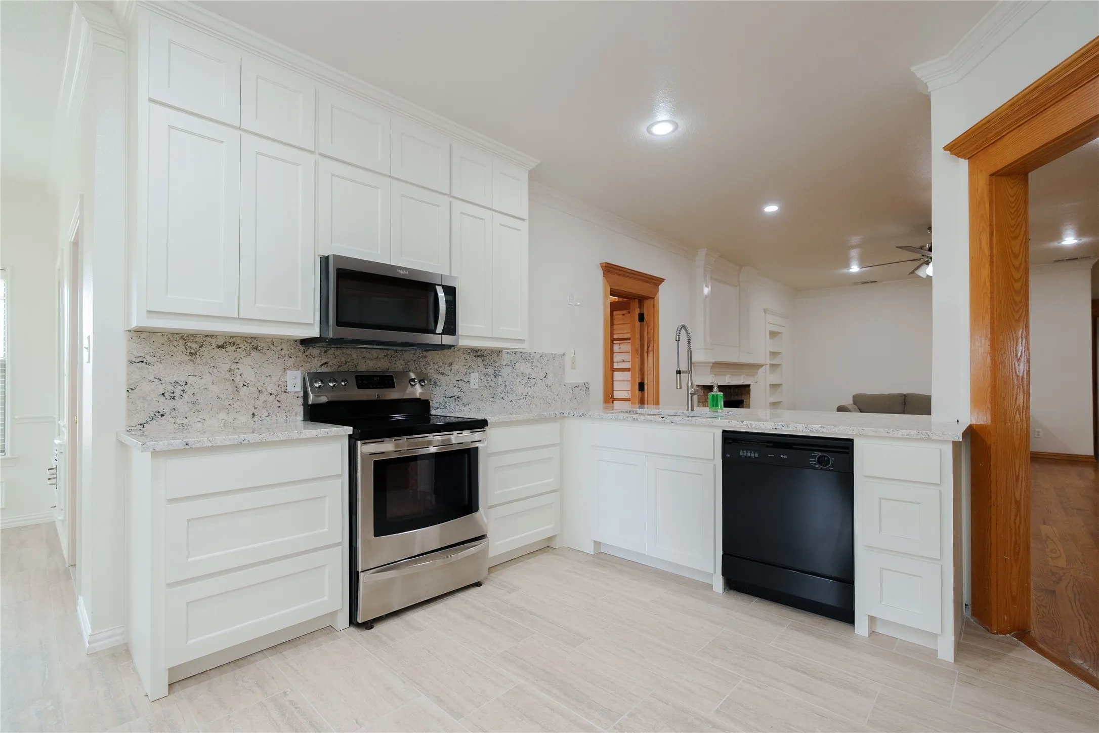 New kitchen cabinets, counters, floors and appliances.