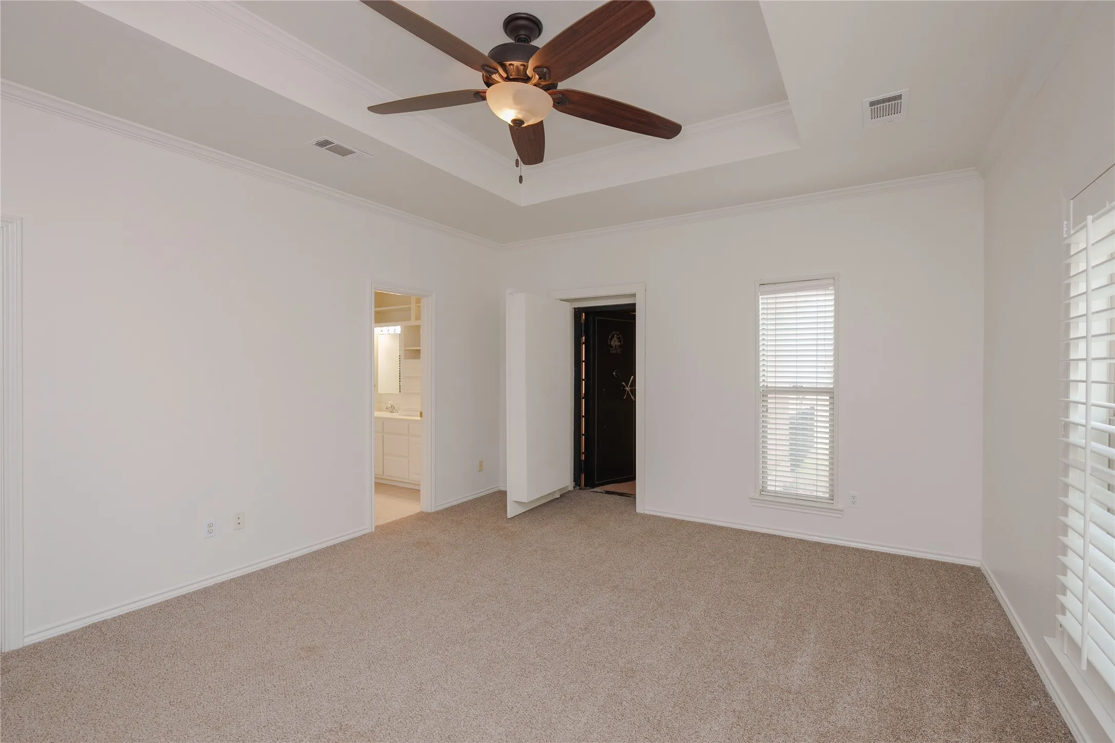 Primary Bedroom offers 2 closets, and a full bath with jetted tub, dual sinks, and a separate shower.