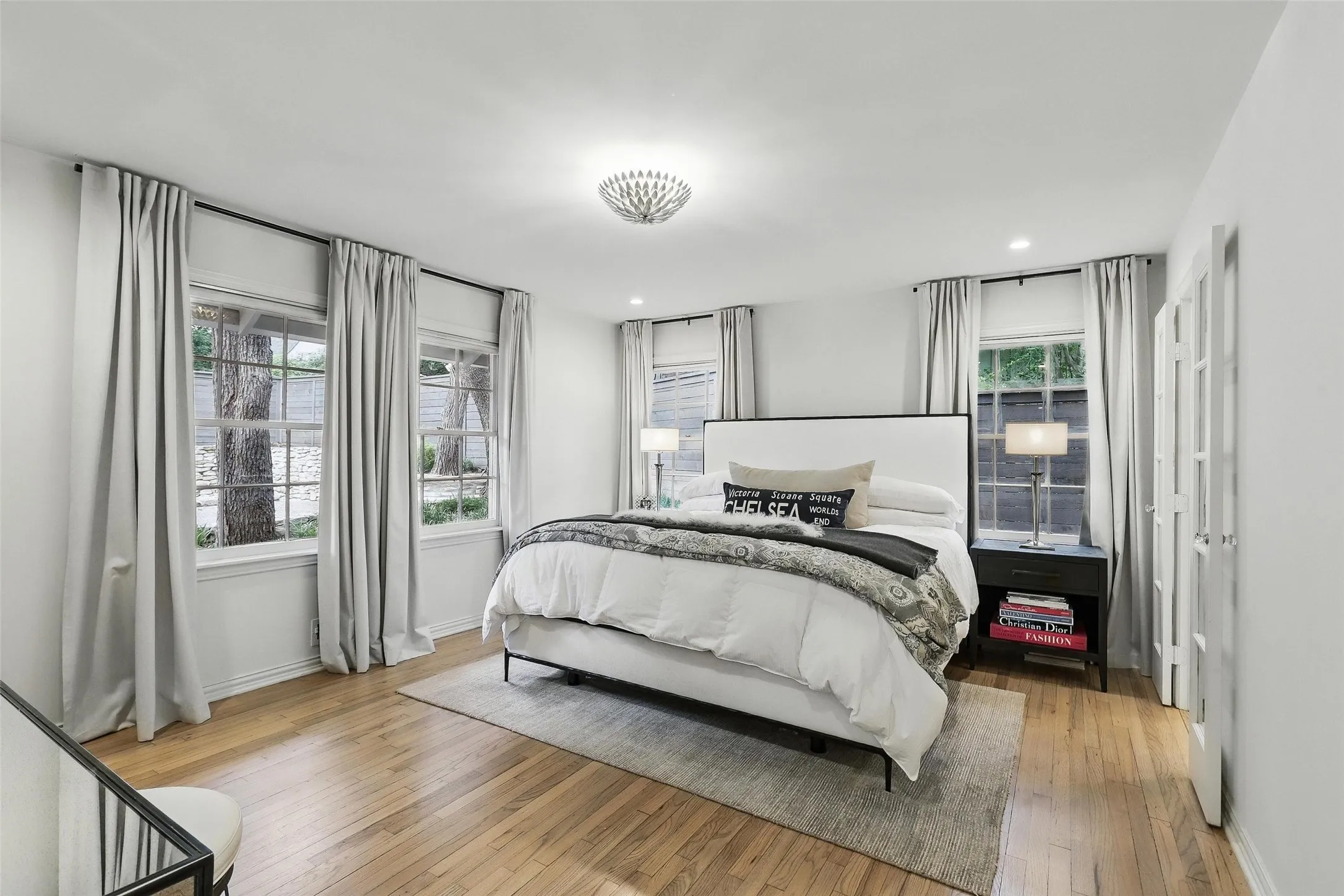 Bedroom featuring light wood-type flooring and recessed lighting