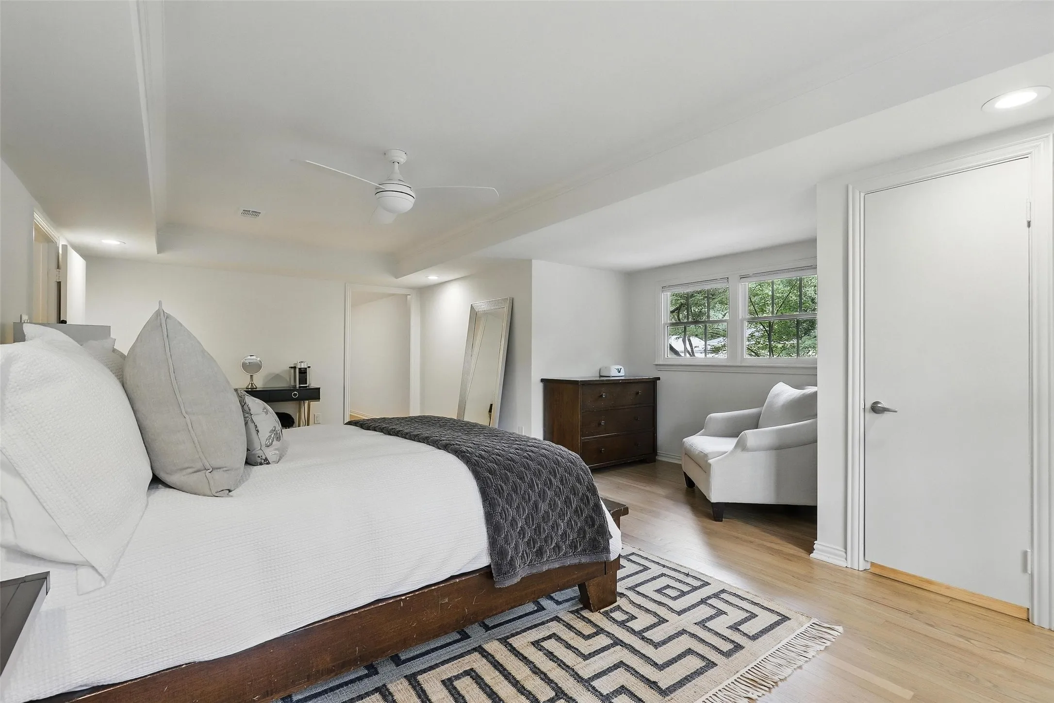 Bedroom featuring recessed lighting, ceiling fan, and light wood-style flooring