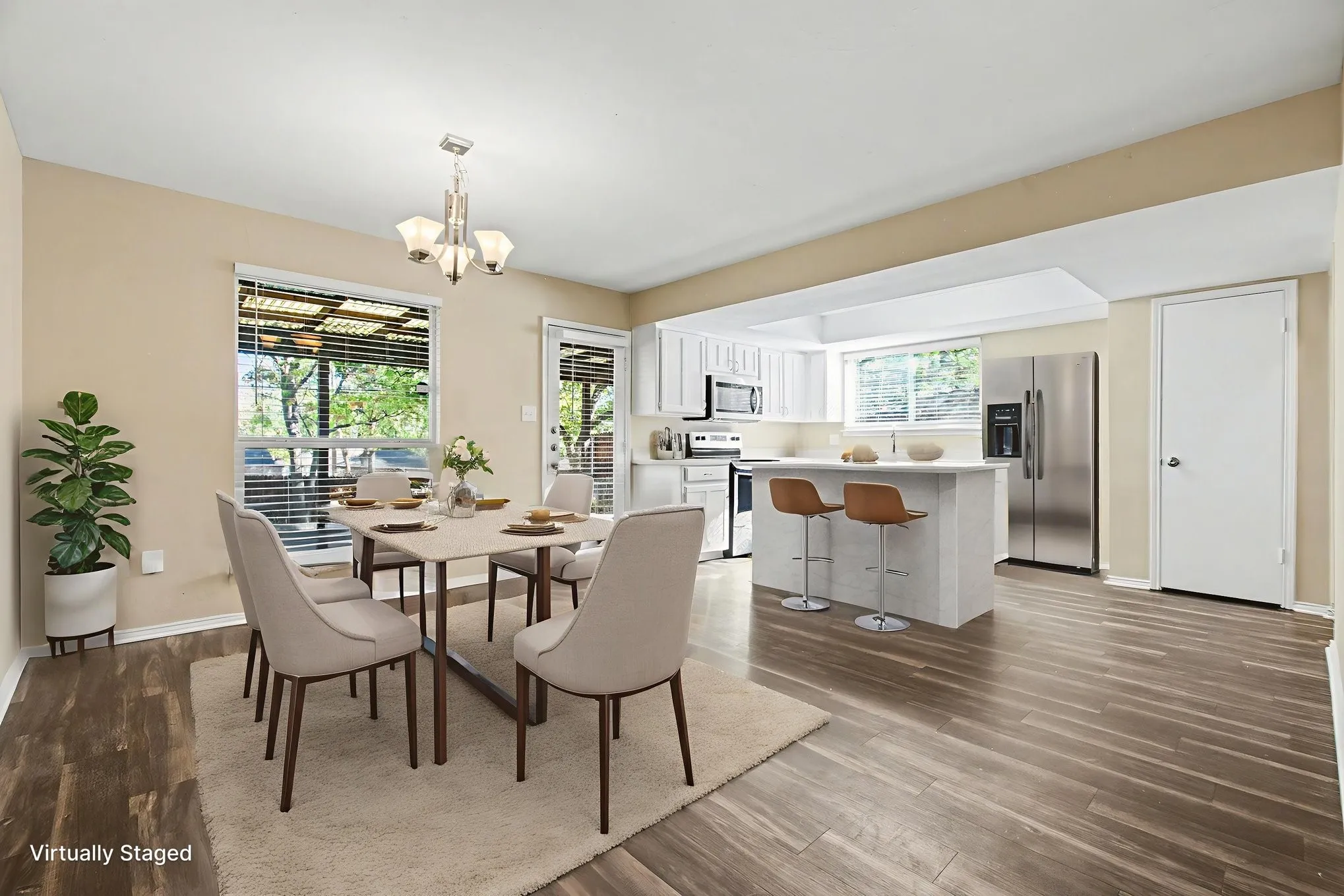 Virtually staged eat-in kitchen dining area
