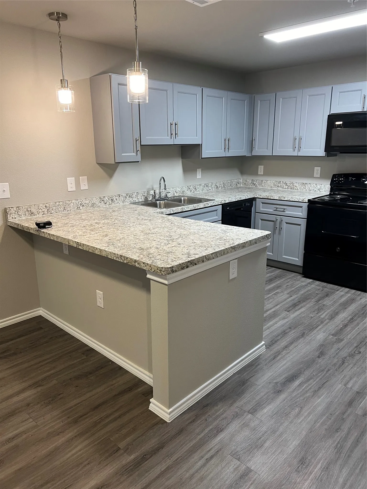 Another view of the kitchen