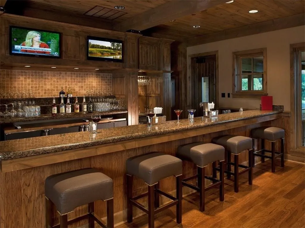 Indoor wet bar featuring a wood ceiling with exposed beams, wood finished floors, backsplash, and recessed lighting