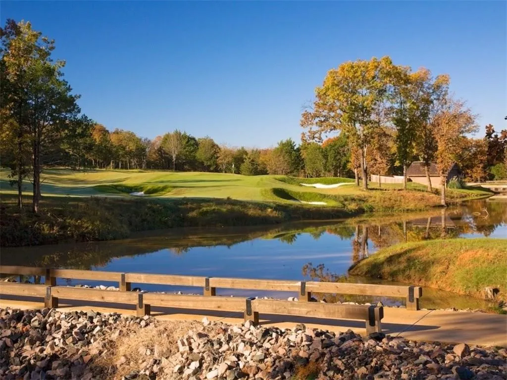 Water view with a local golf course