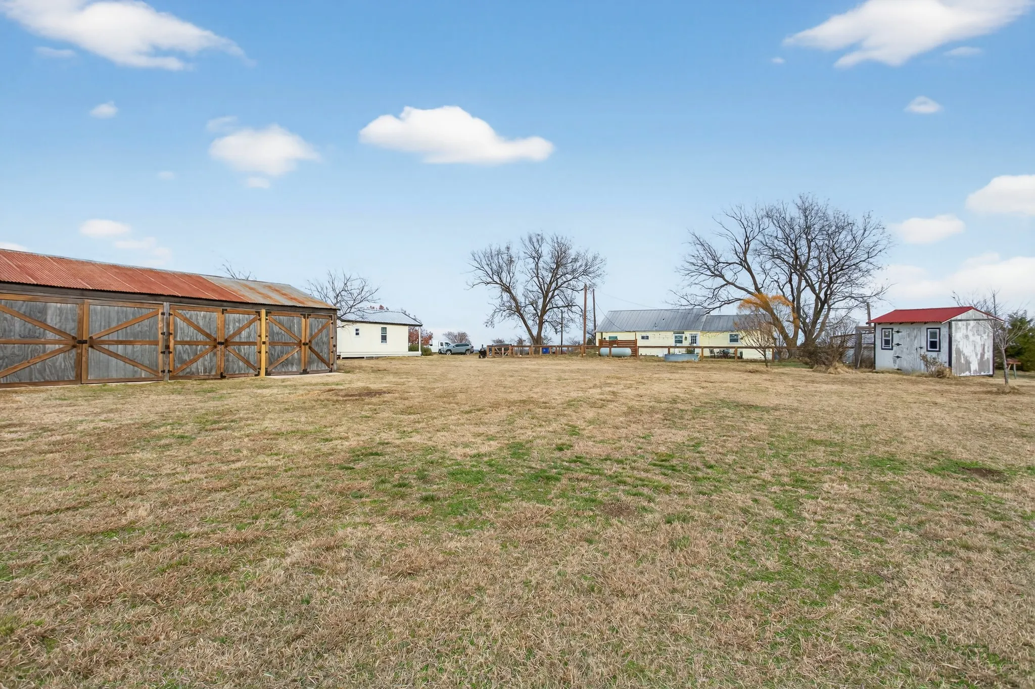 concrete floor, used for storage but is the detached garage/barn