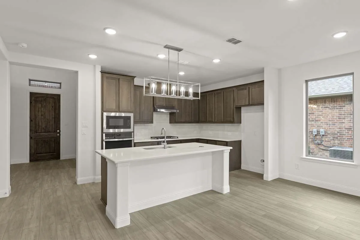 02-1443-canadian-ln-van-alstyne-tx-kitchen-island-view