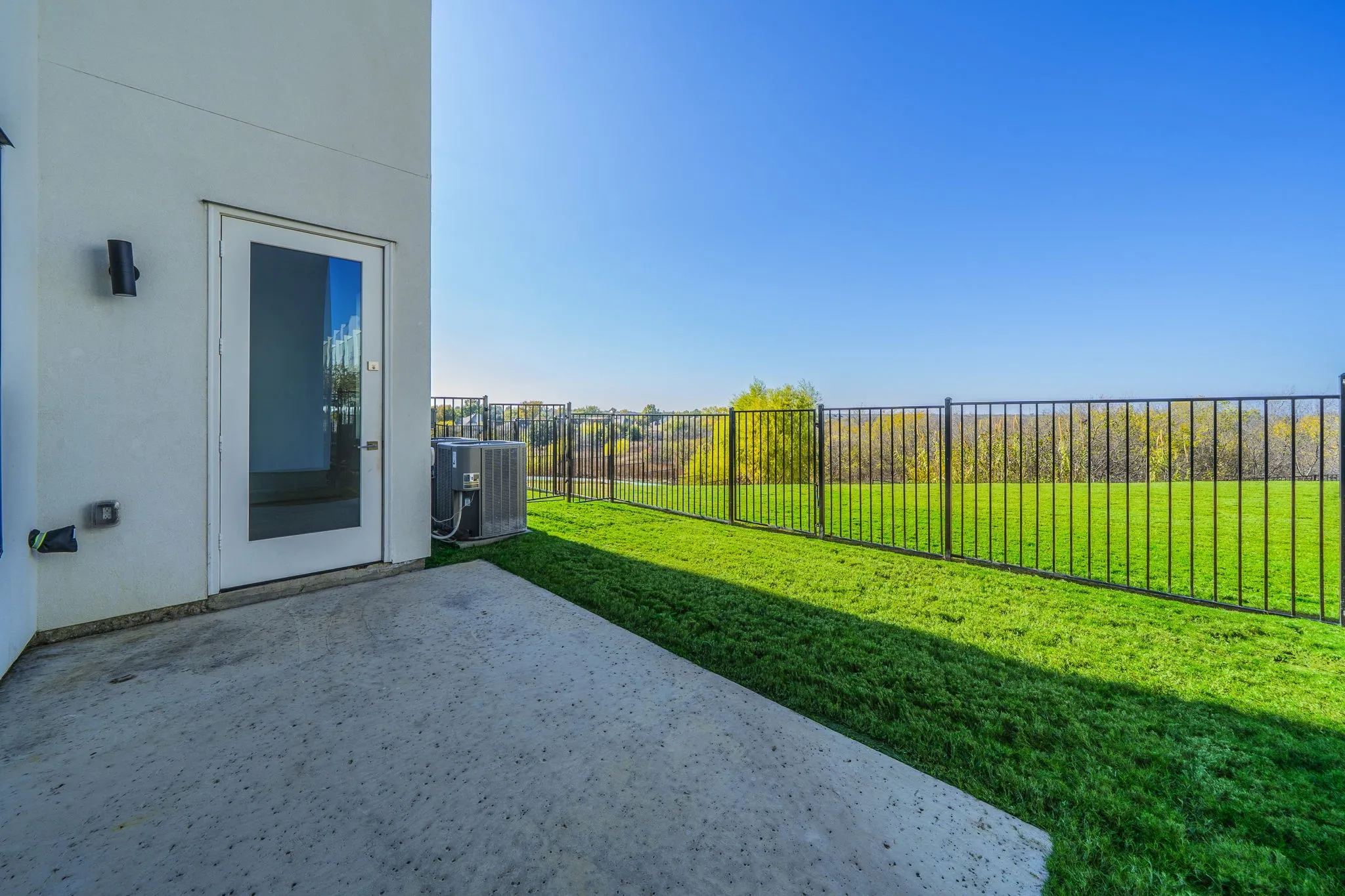 Fenced backyard featuring a patio area