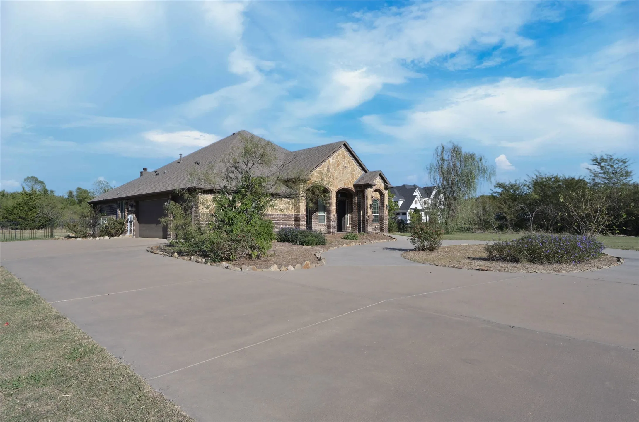 Front circular drive and side 3 car Garage