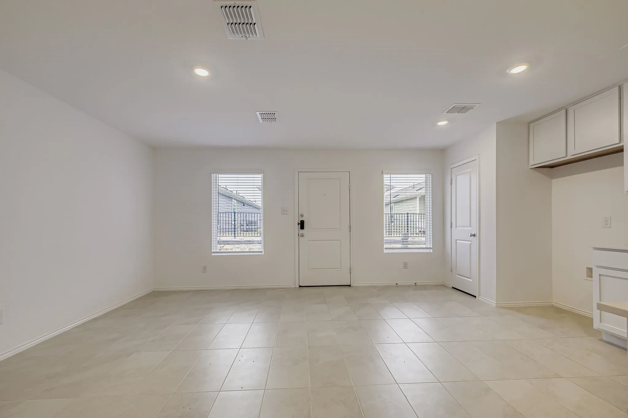 Living room with oversized tile flooring