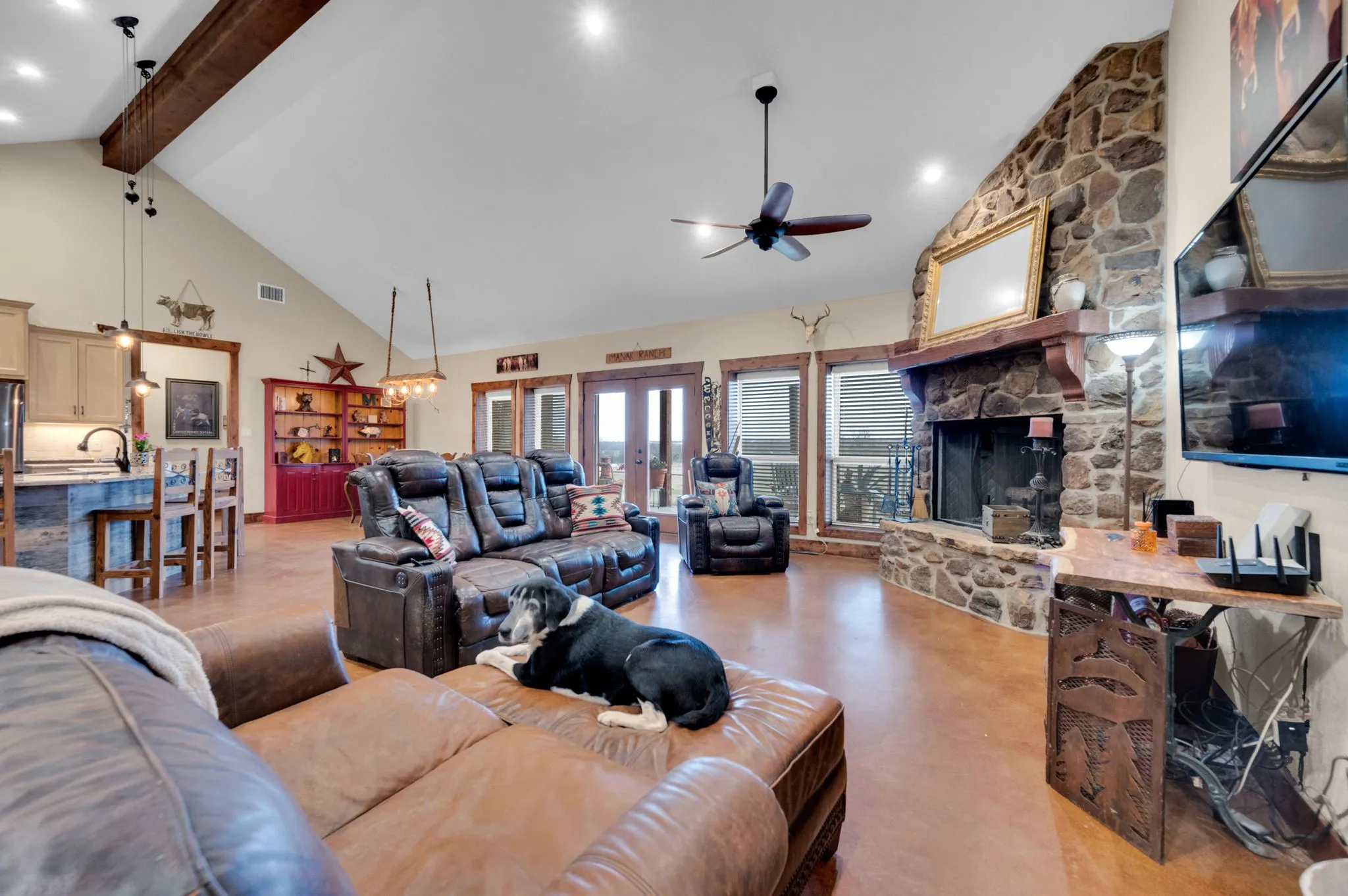 Open concept is perfect for family and entertaining. Gather around this beautiful fireplace this winter!