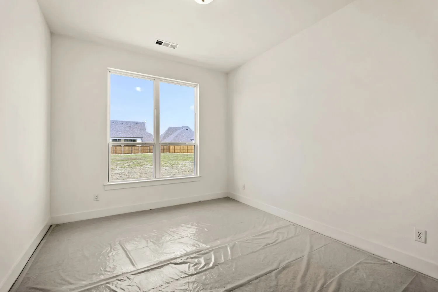 Spare room with baseboards