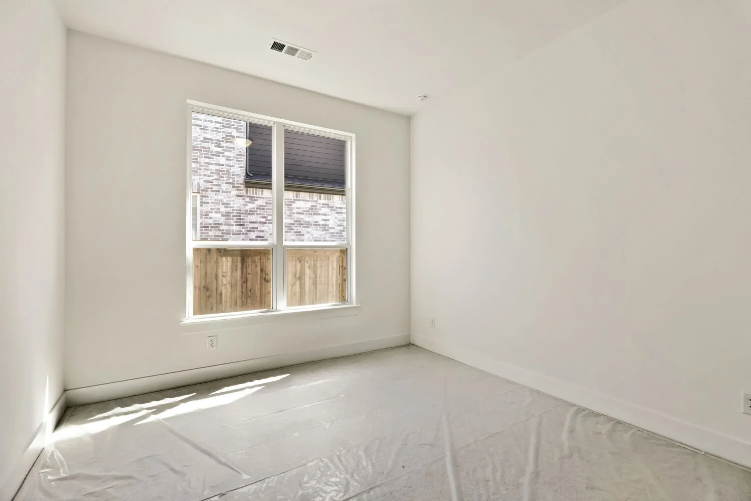 Empty room with baseboards
