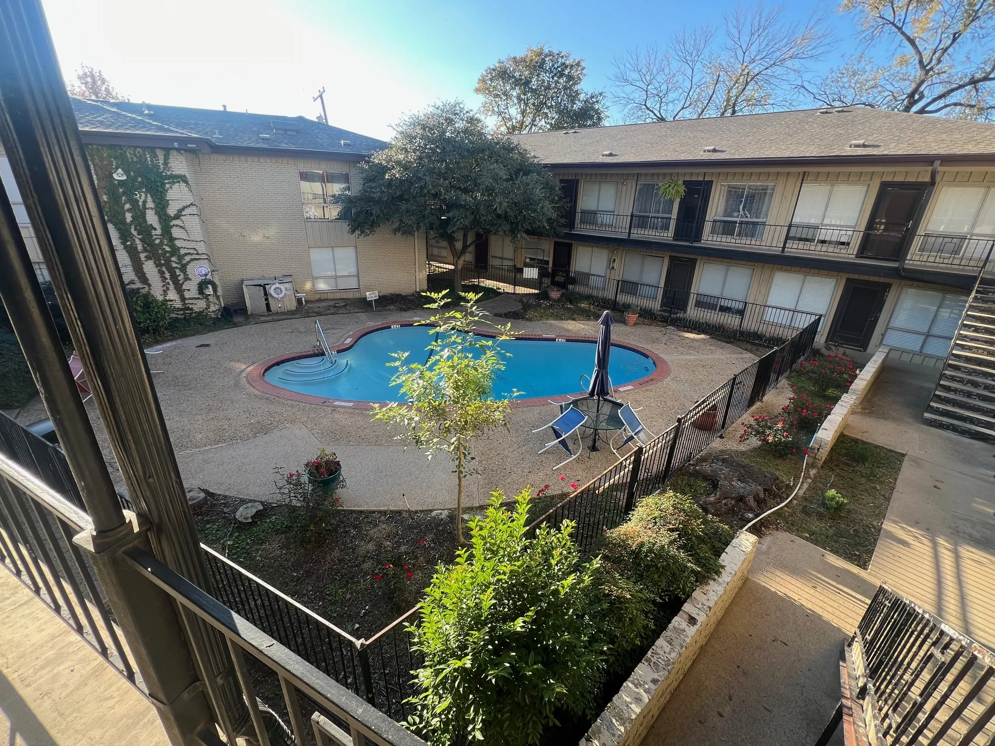 Community pool with a fenced area