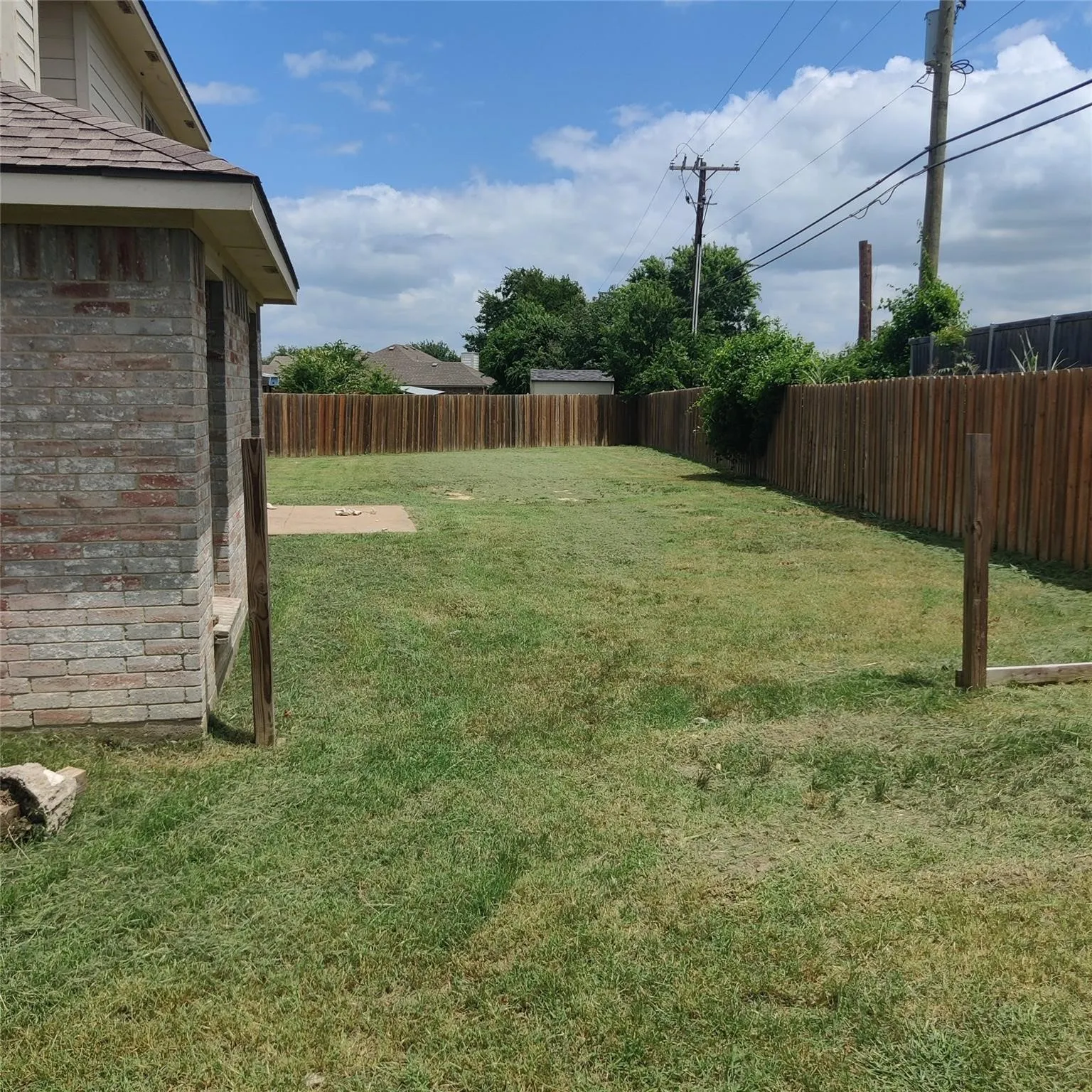 View of fenced backyard