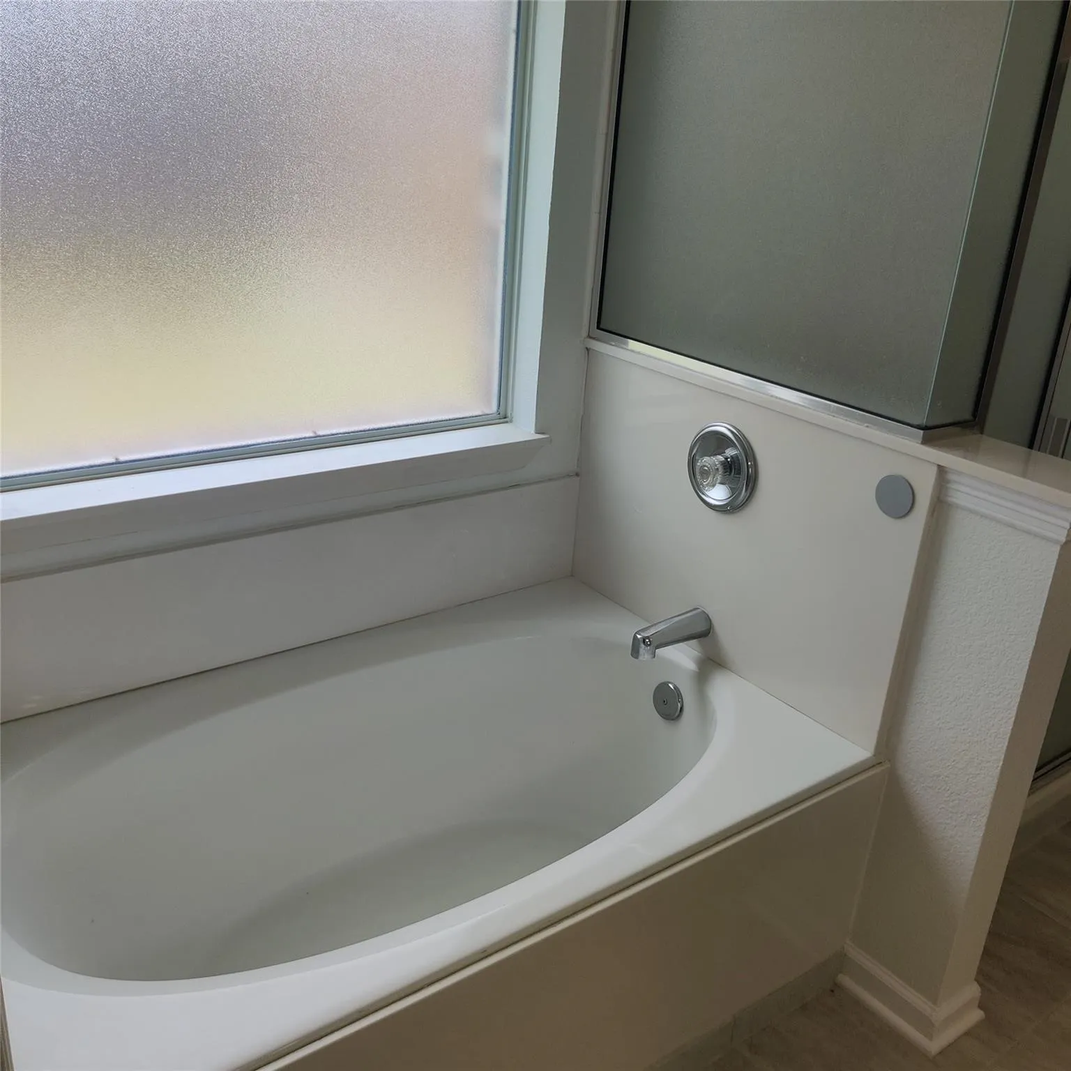 Bathroom featuring a garden tub