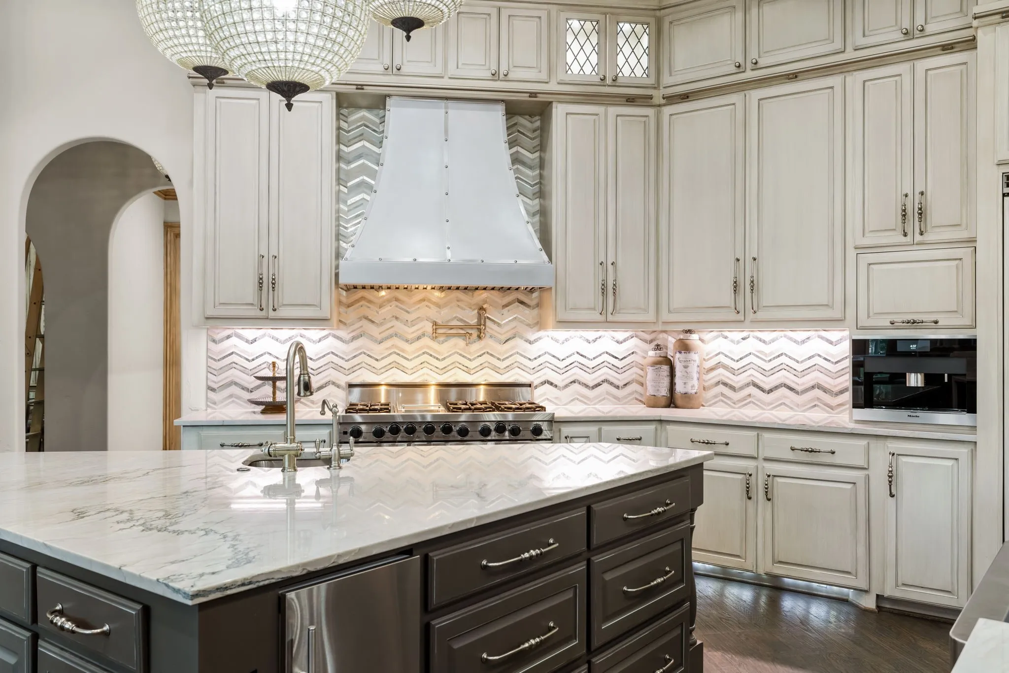 The chefs kitchen anchors the estate with professional-grade Viking appliances, bespoke
cabinetry, and built-in Miele coffee system.