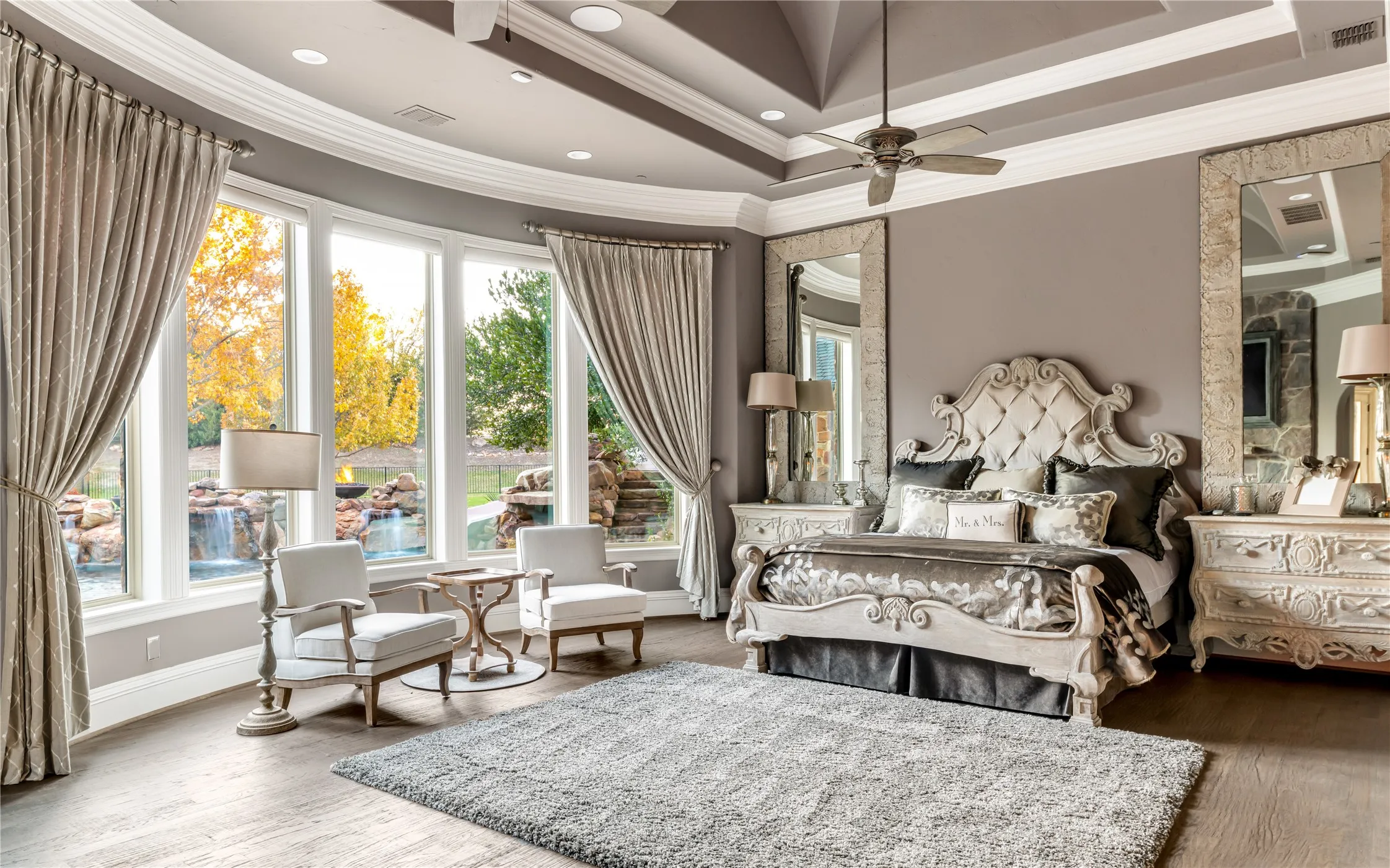 Spacious primary bedroom with fireplace and Miele Coffee station