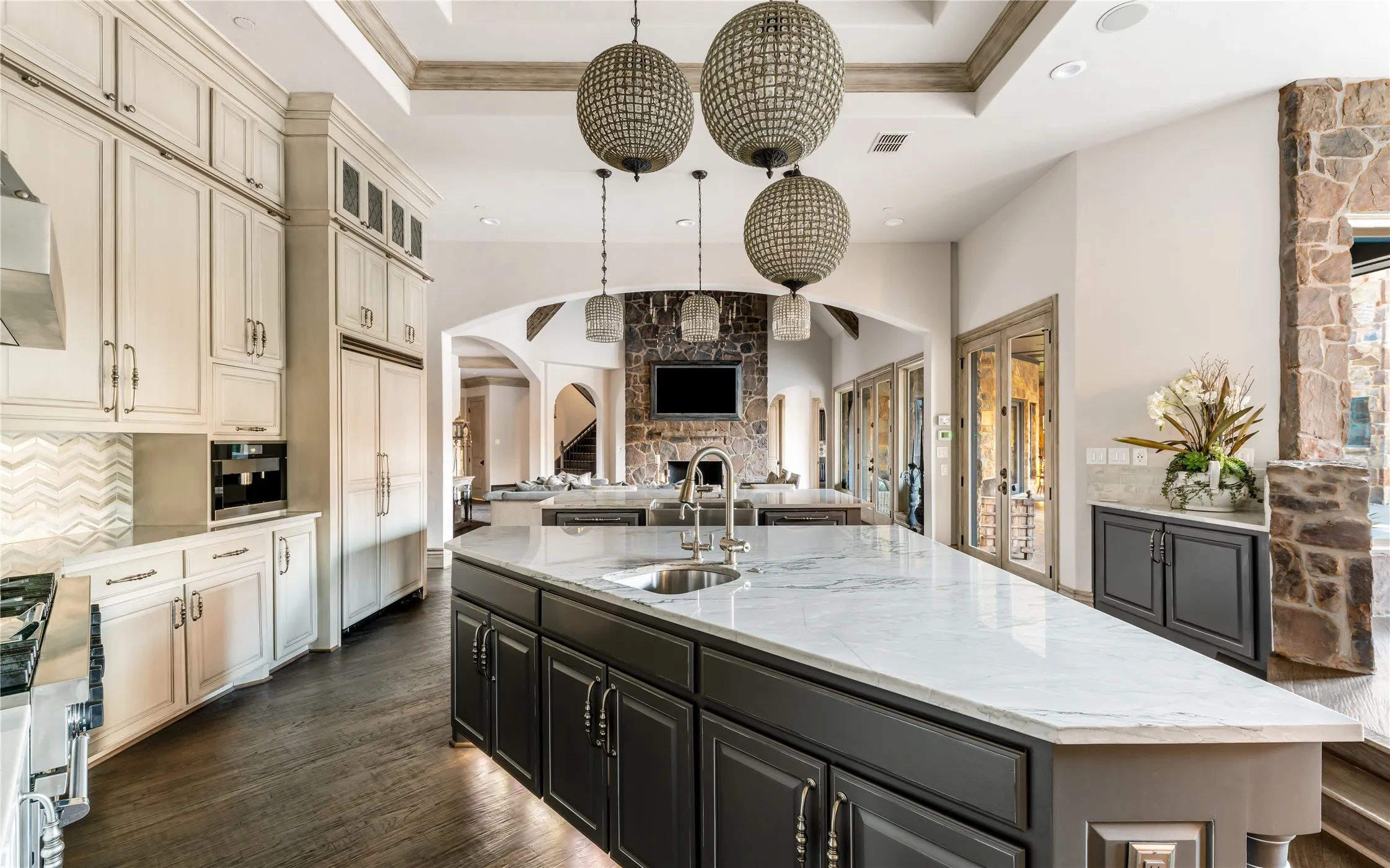 The chefs kitchen anchors the estate with professional-grade Viking appliances, bespoke
cabinetry, and built-in Miele coffee system.