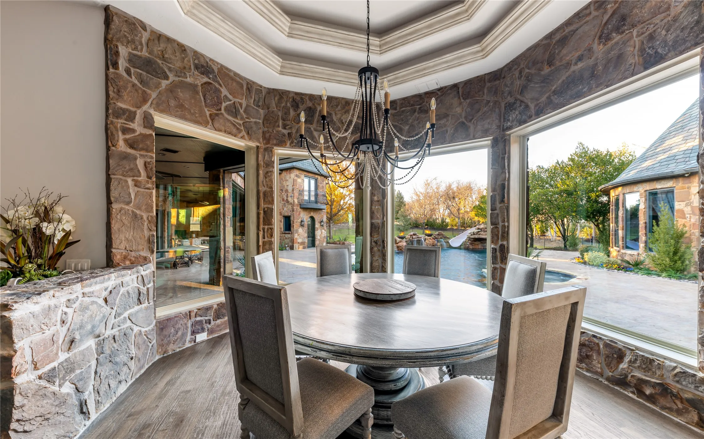 Elevated in kitchen dining with views of the pool
