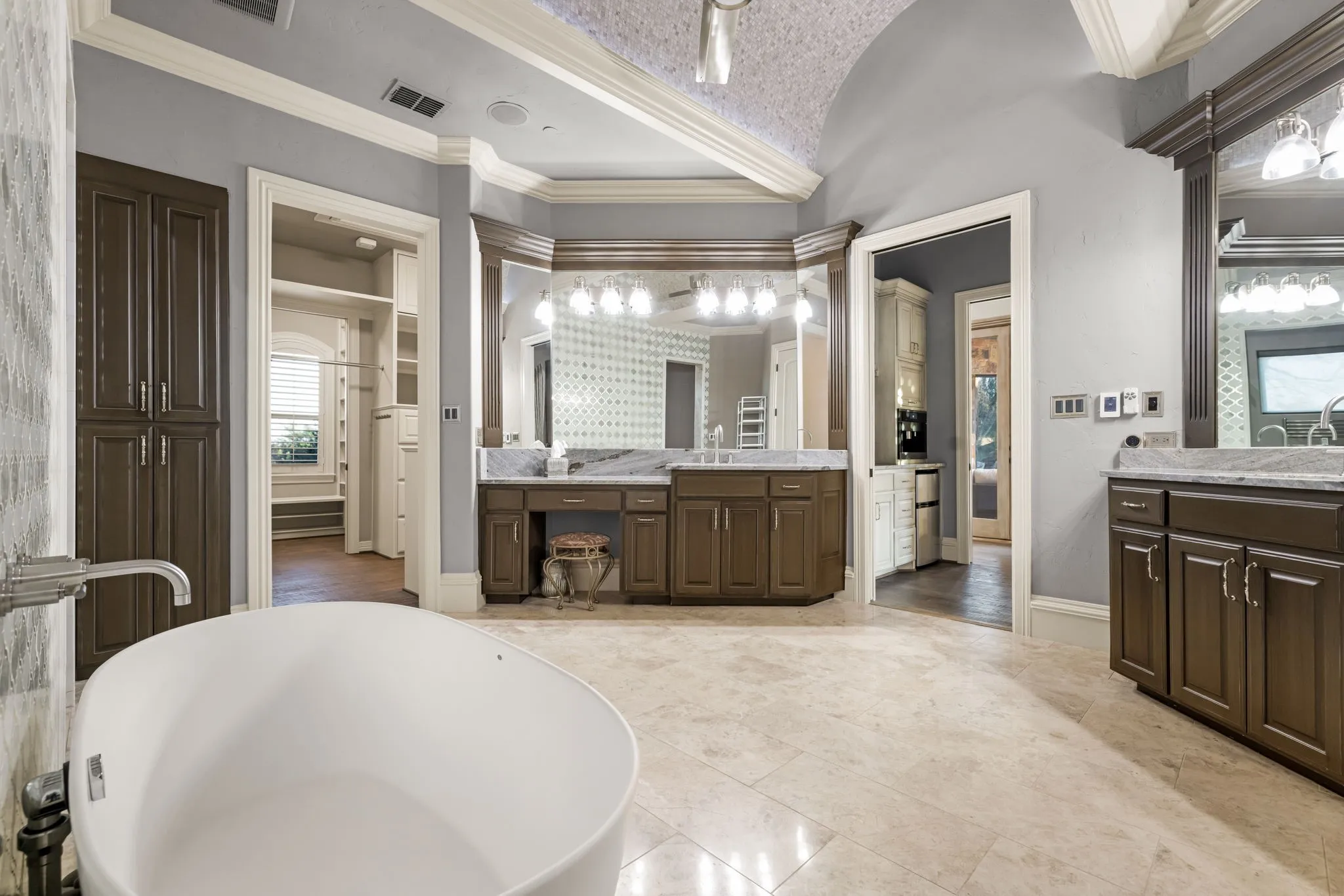 Double vanity and soaking tub int he primary bathroom