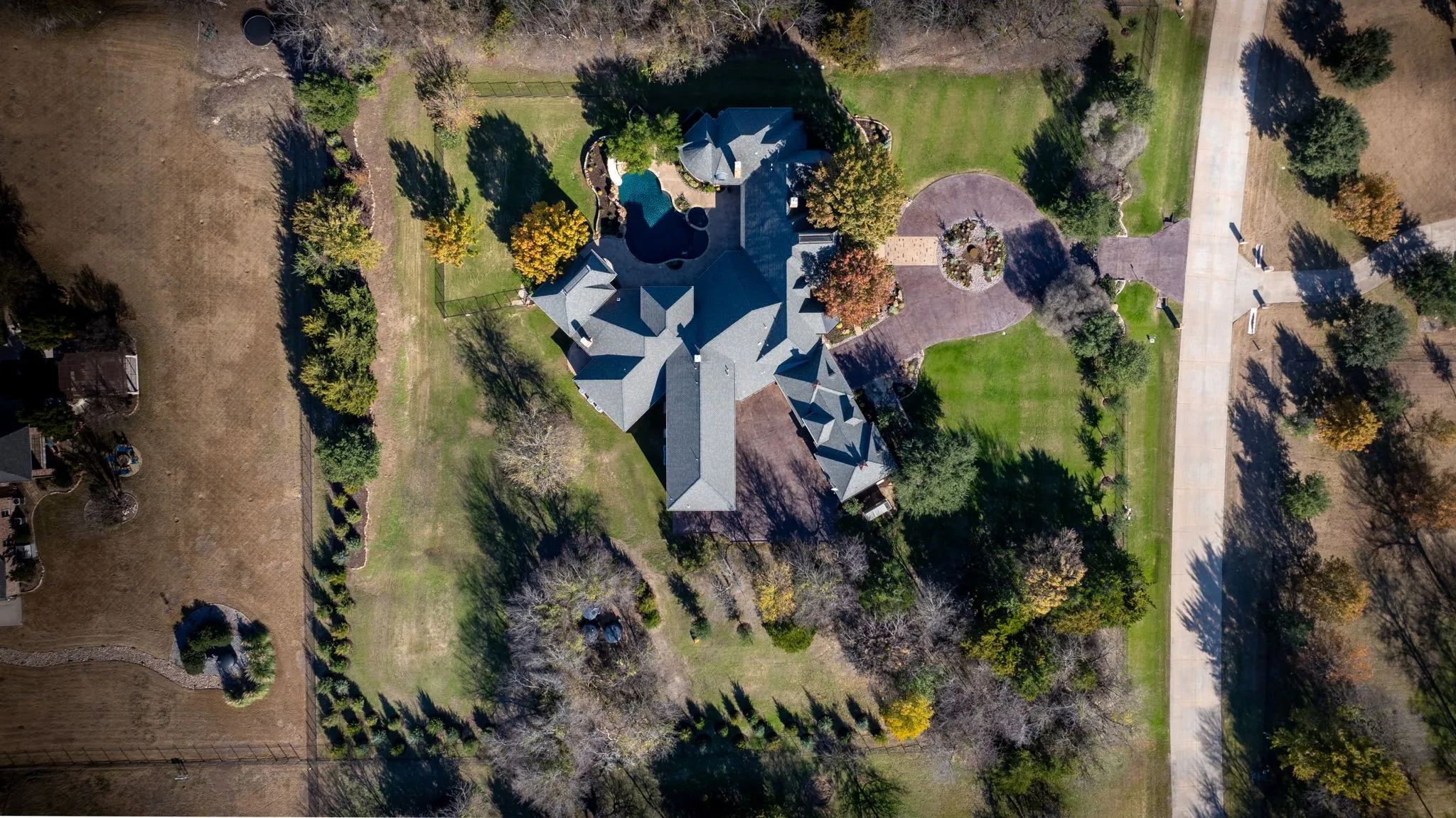 A rare offering in Prosper, this privately gated French-inspired estate presents an exceptional standard of turnkey luxury, privacy, and architectural refinement