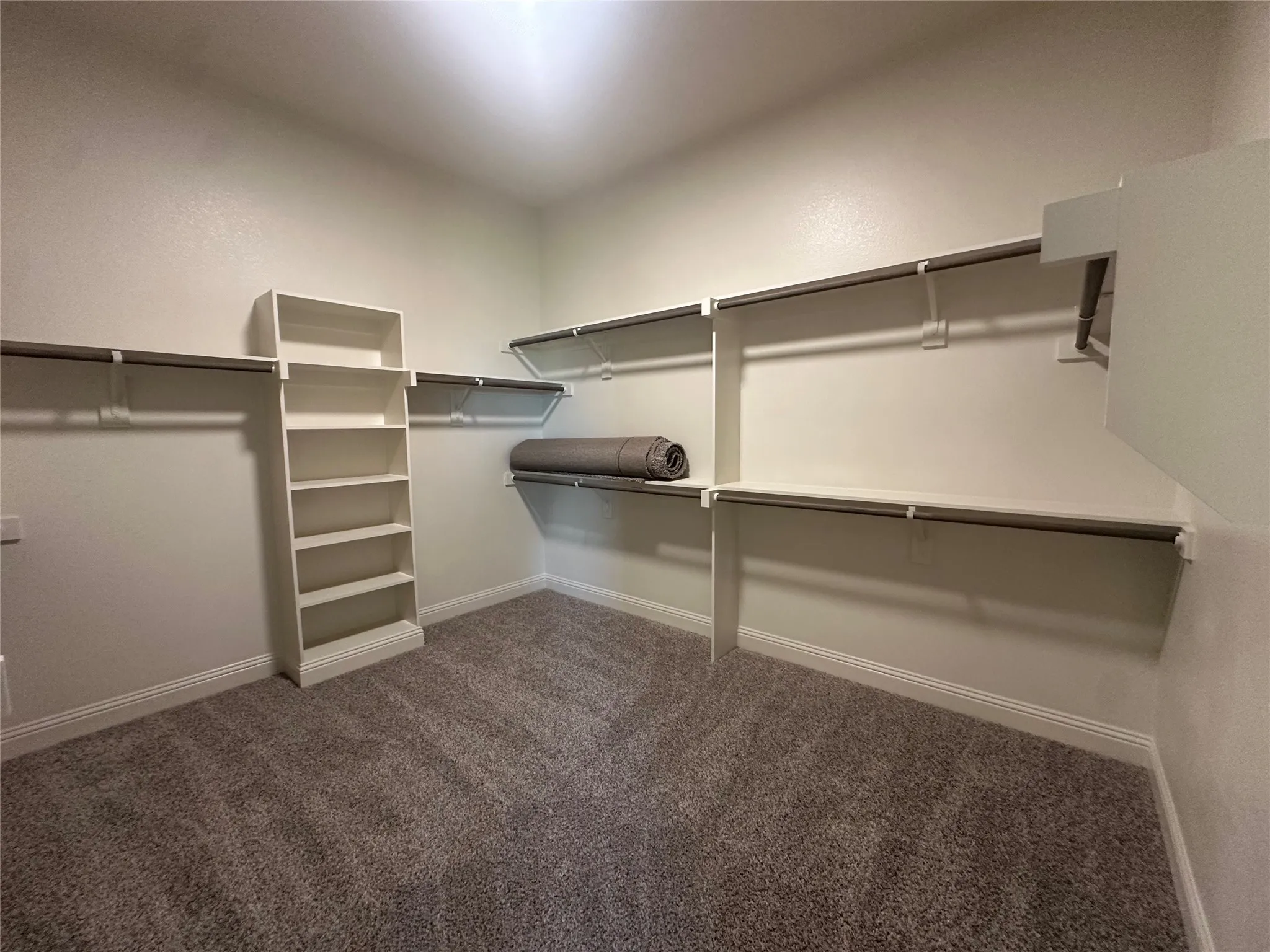 Primary closet connects to utlity
