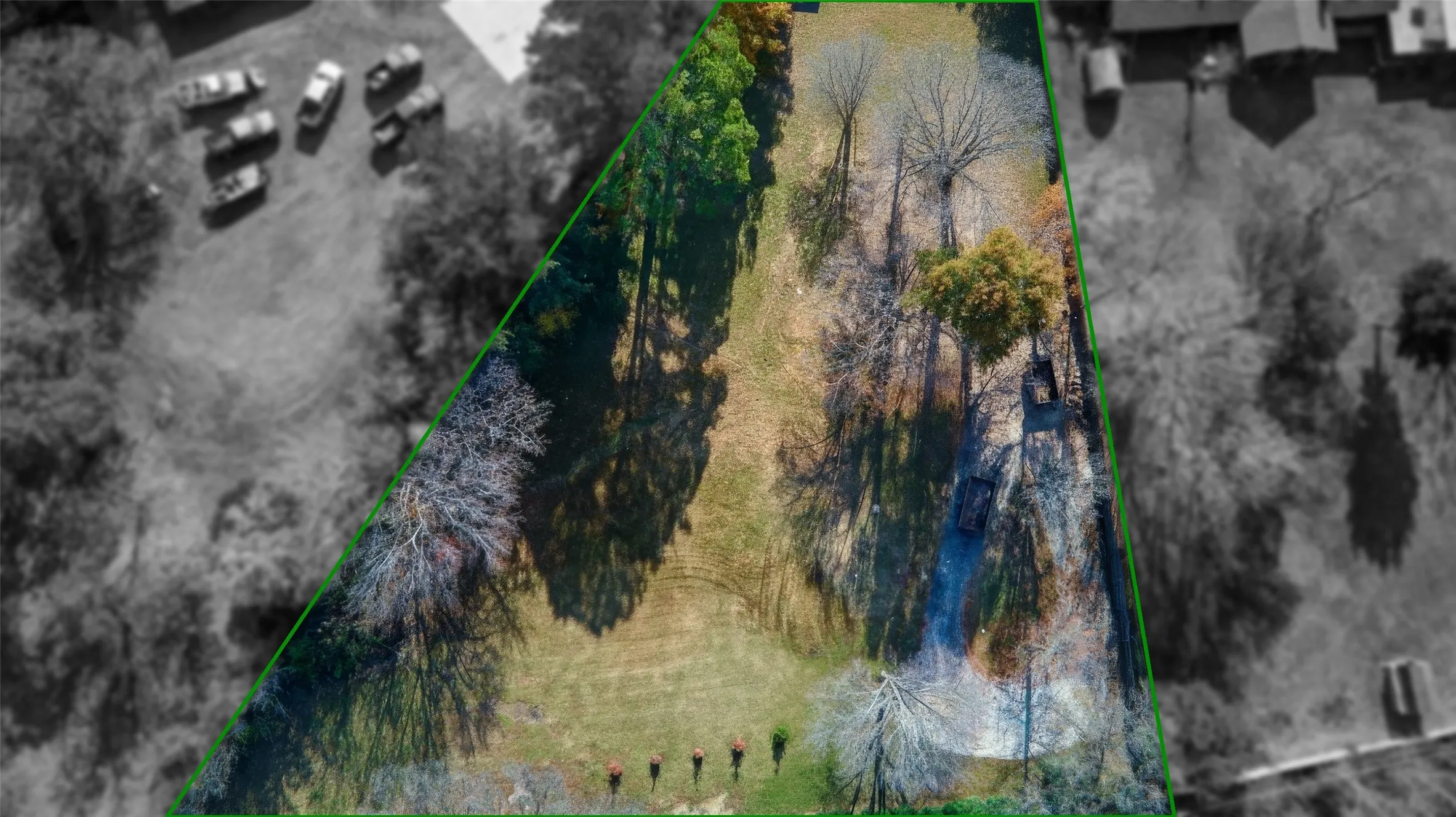 Edited photo with house removed. Aerial view of property and surrounding area featuring property boundaries highlighted