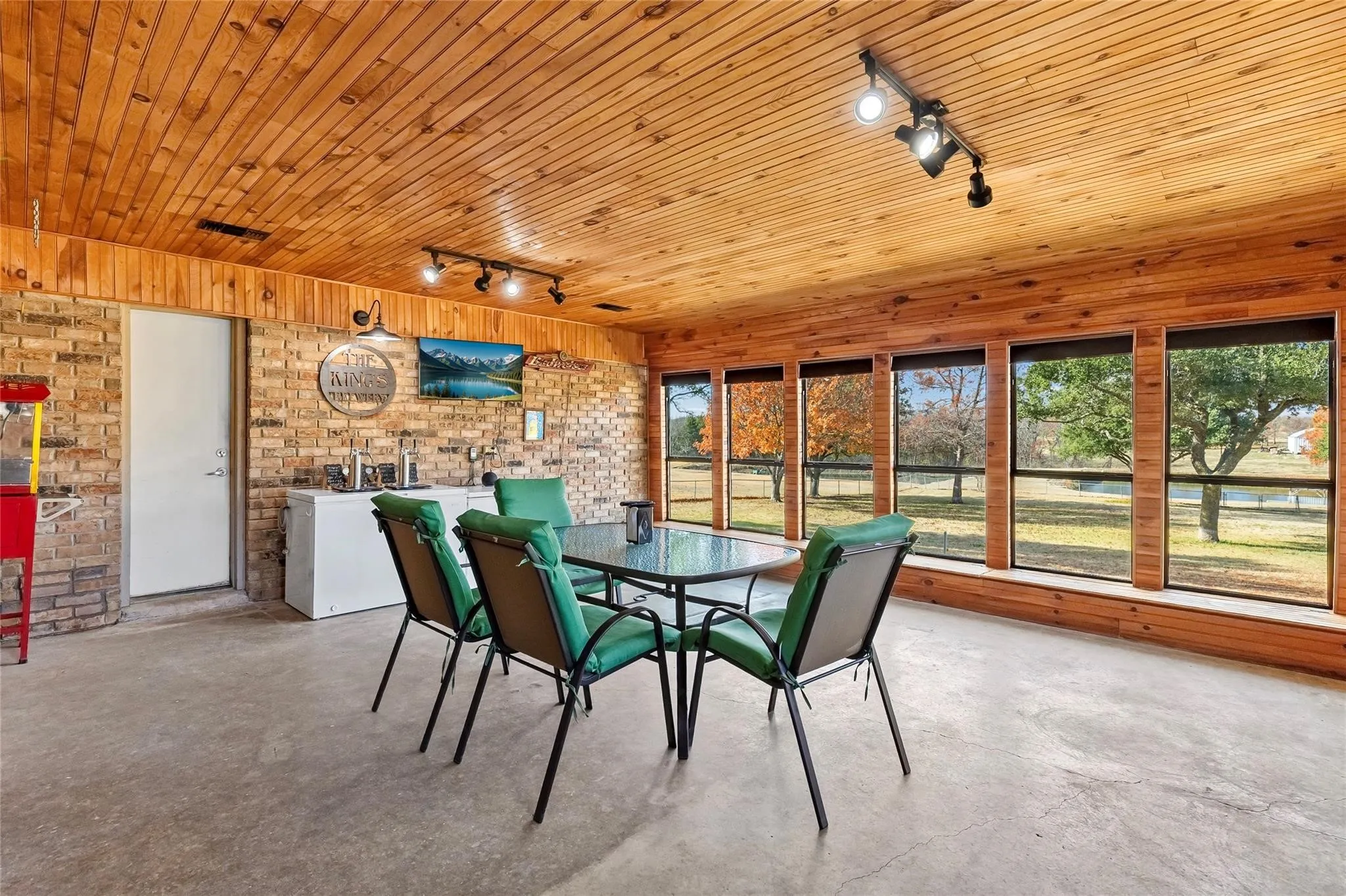Enclosed porch is perfect for entertaining