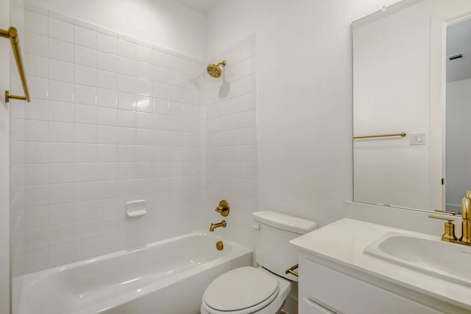 Full bath featuring vanity and shower / washtub combination