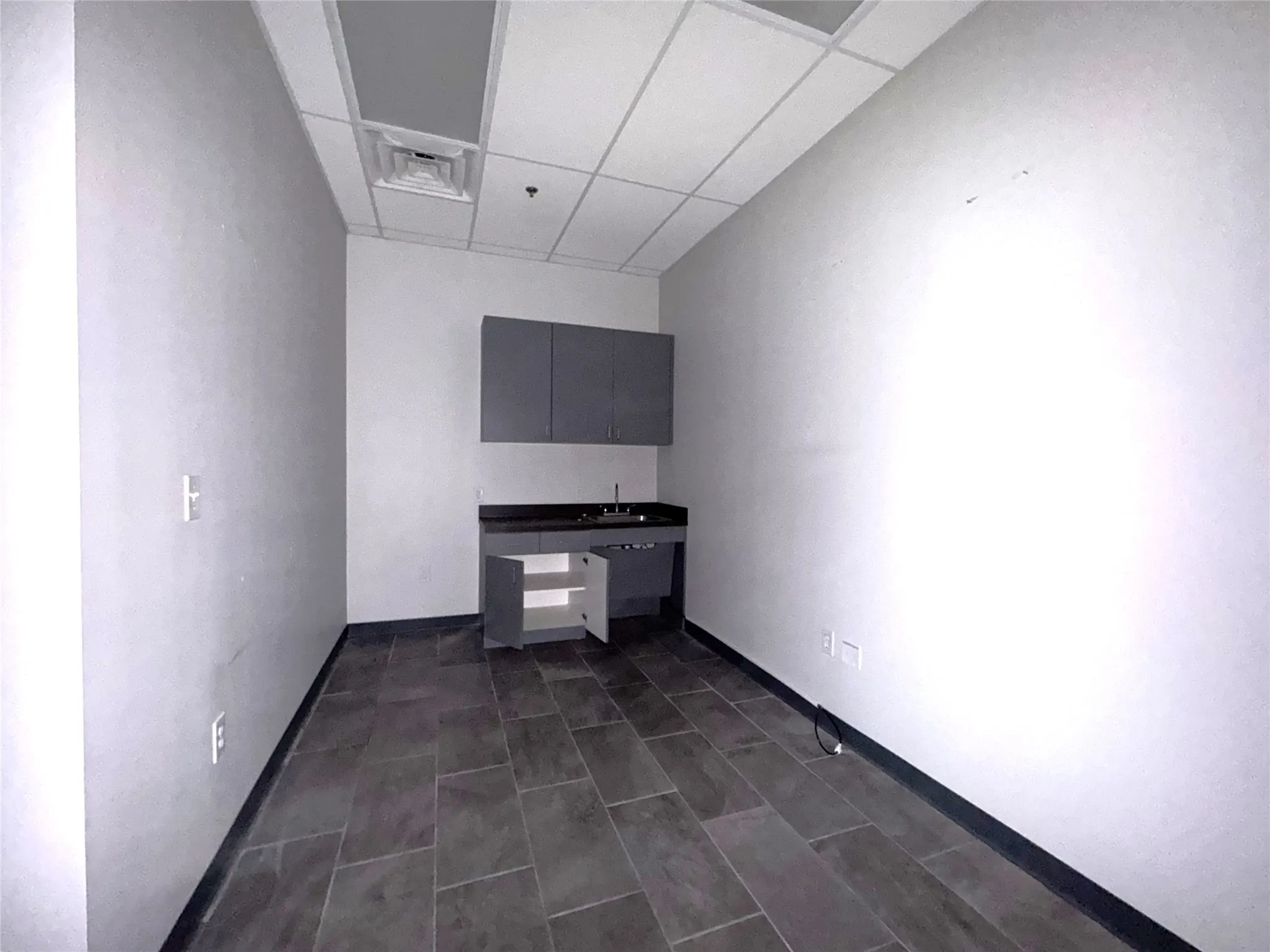 Kitchen Area with Sink, Room for Refrigerator