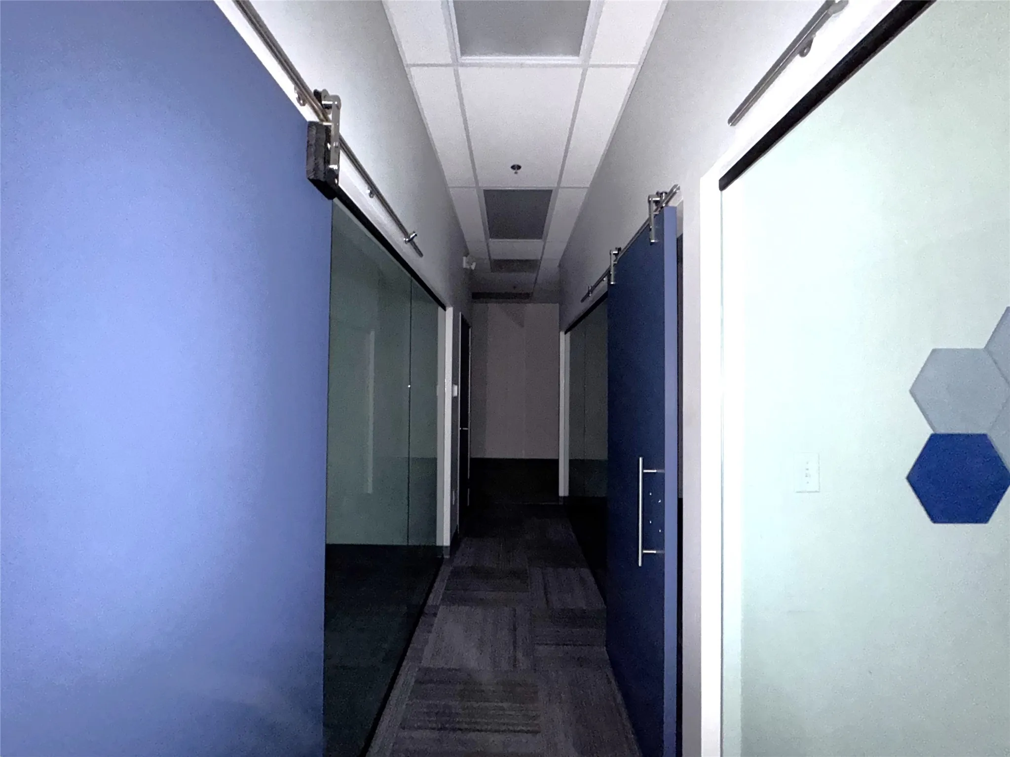 Hallway to additional Offices and Kitchen Area