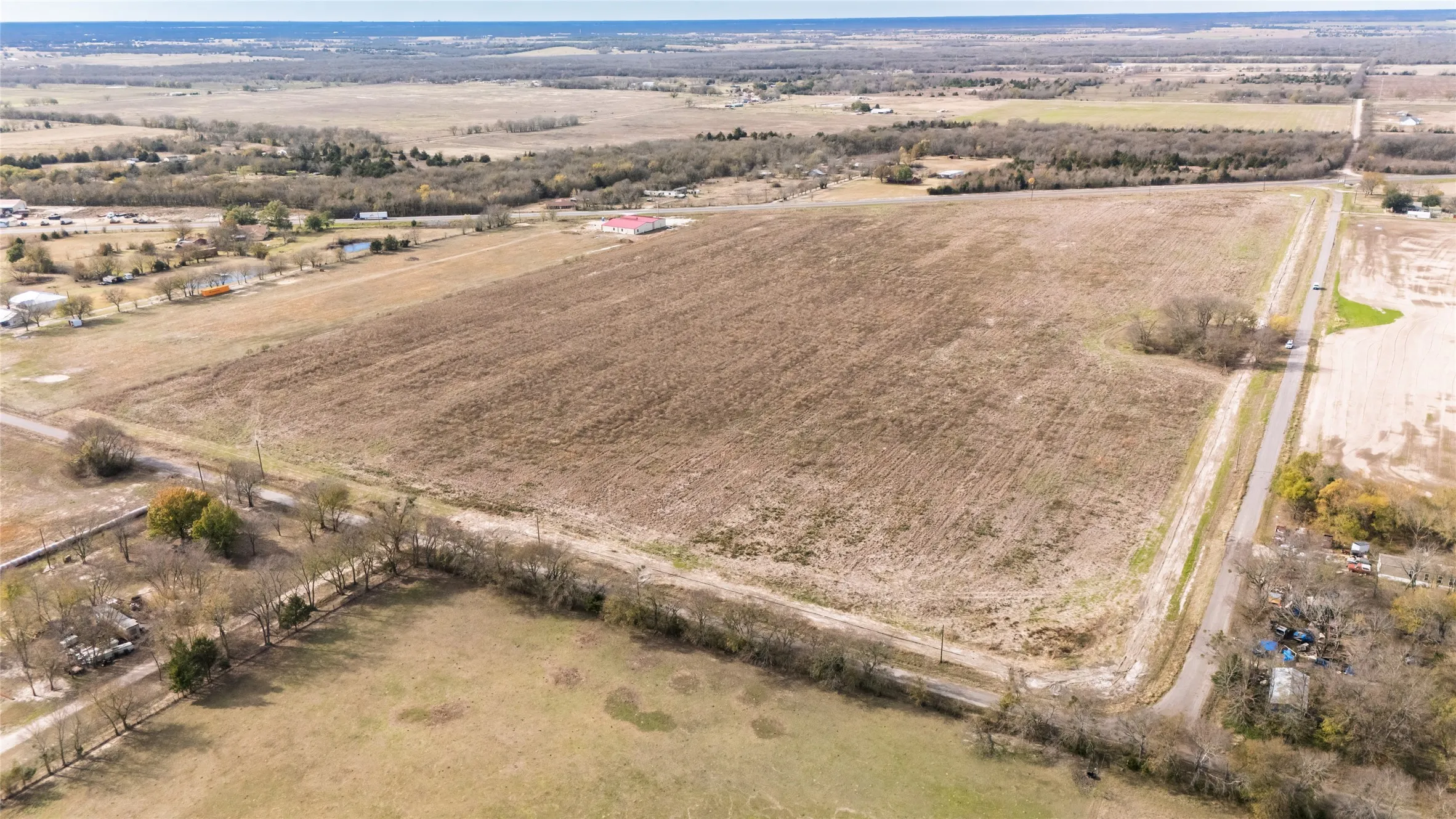 Aerial overview of property's location with rural landscape