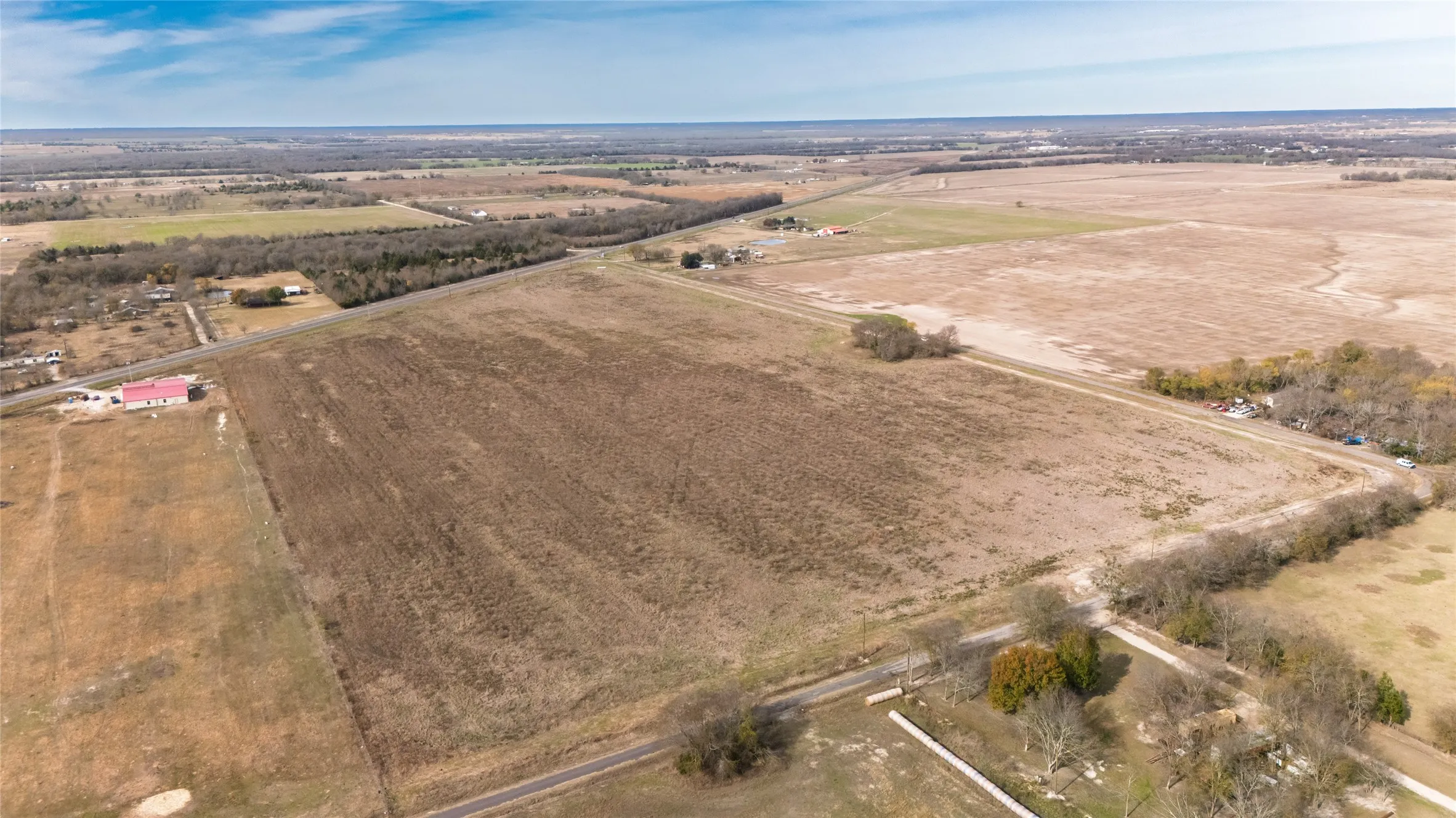 Aerial view of property's location with rural landscape