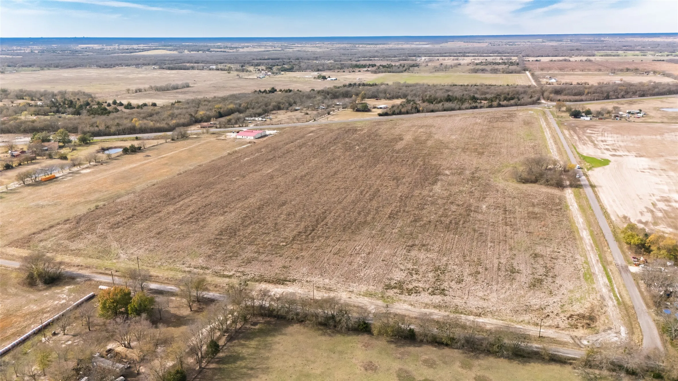 Aerial overview of property's location with rural landscape