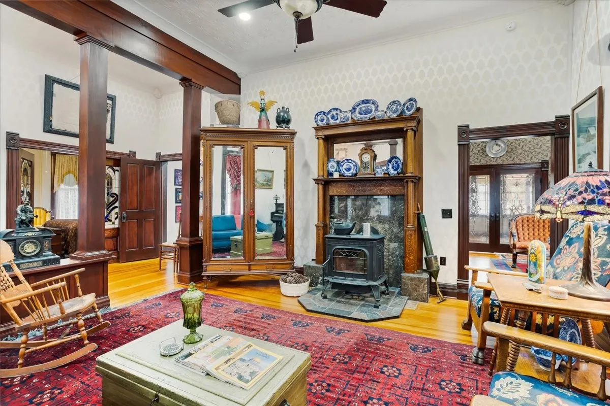 Cozy up in the living room by the free standing wood burning fire place.