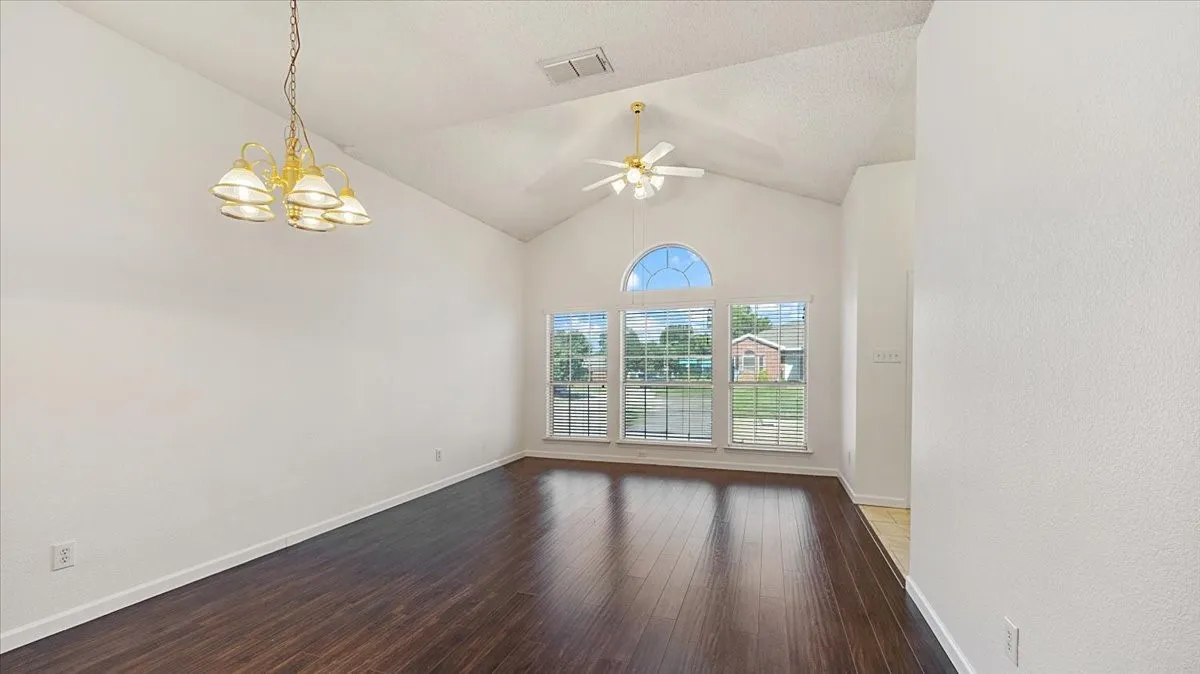Large living room with dining area.