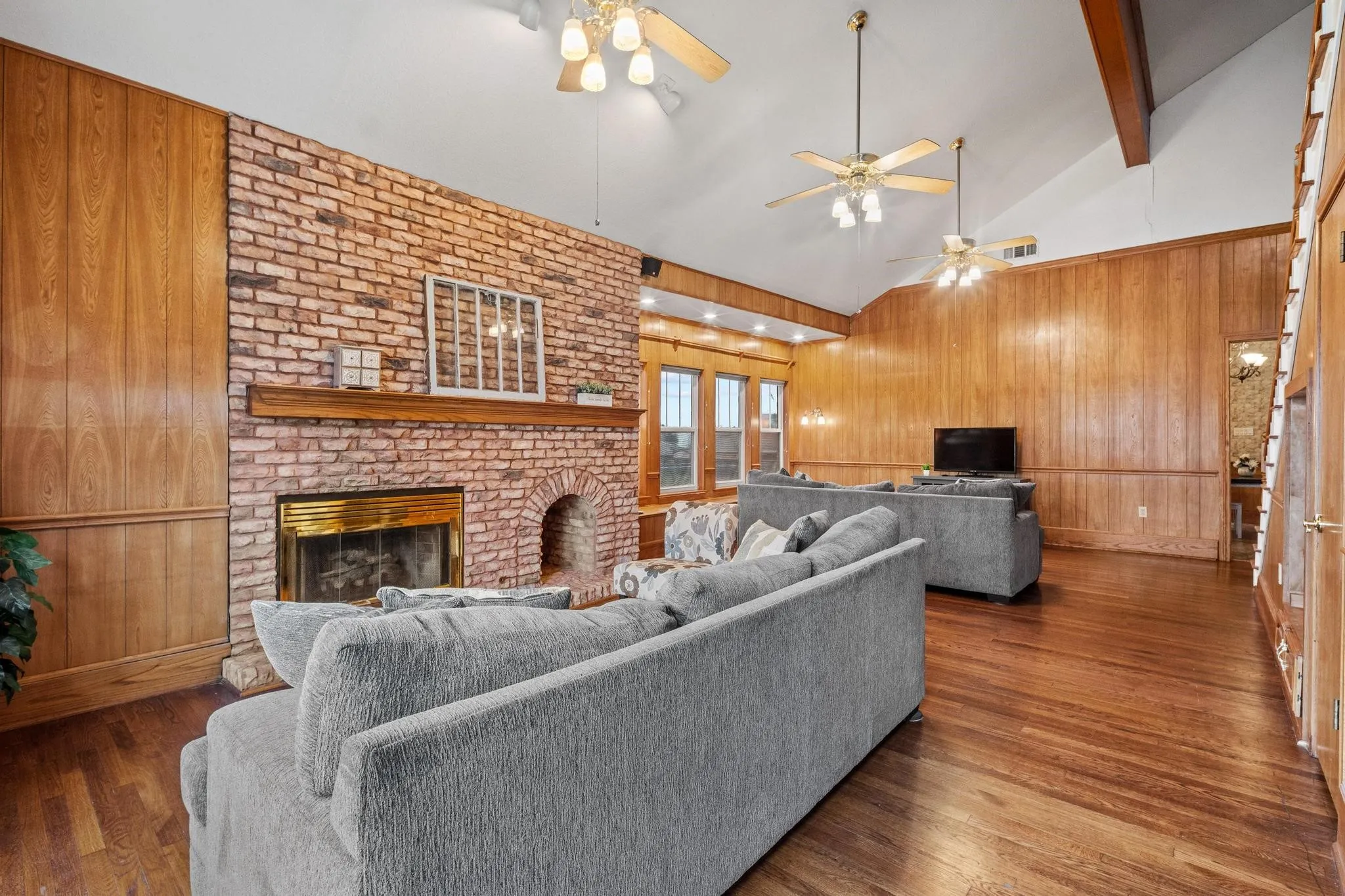 Walking into the main home, notice the room's original hardwood floors!