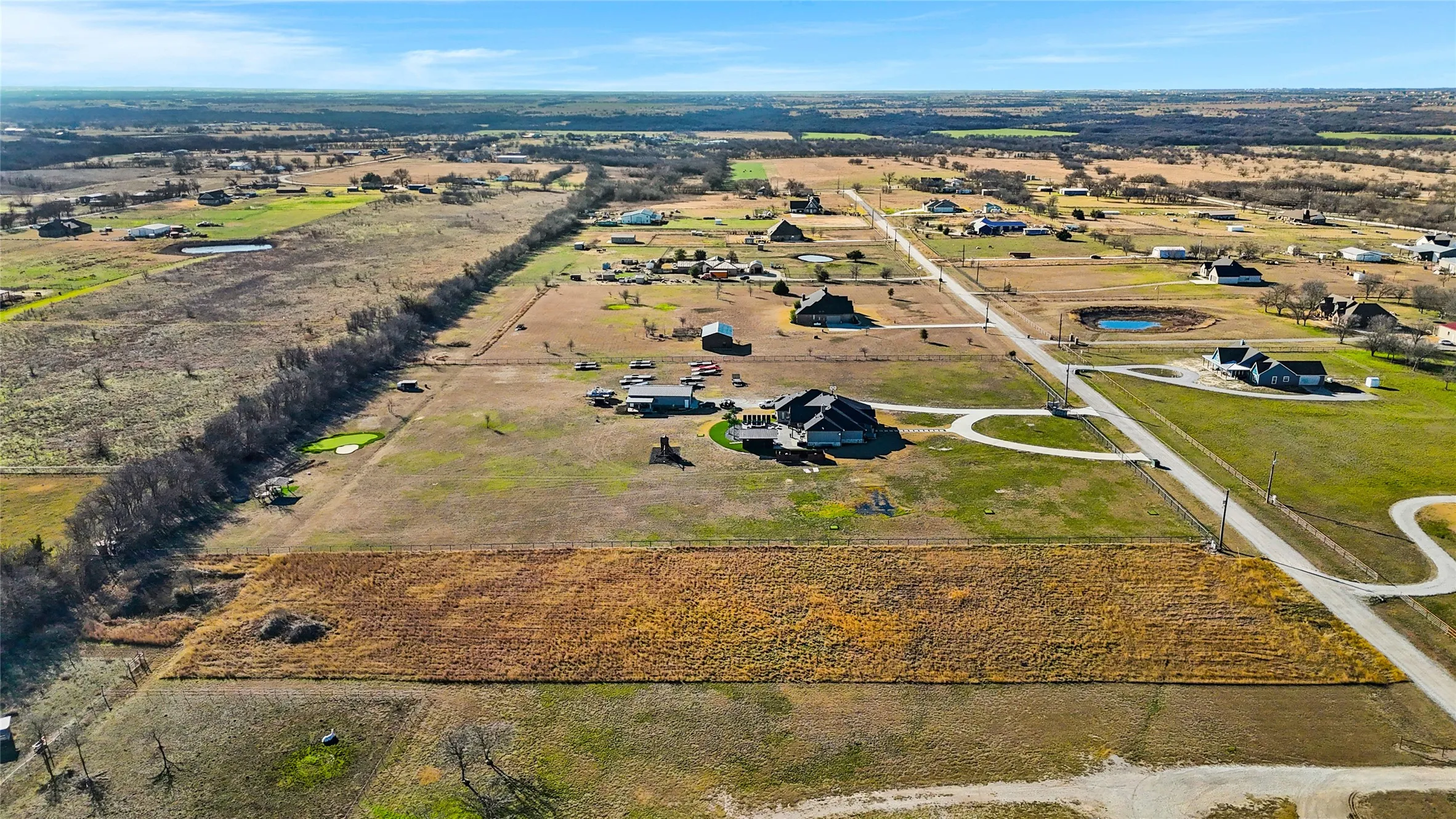 On the north side of the property looking due south.
