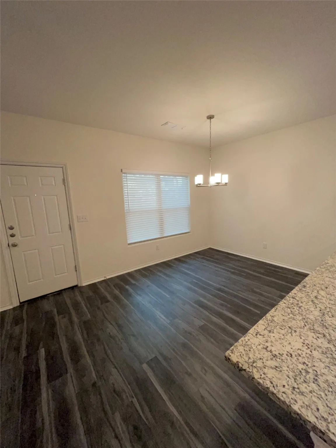 Dining area featuring a chandelier