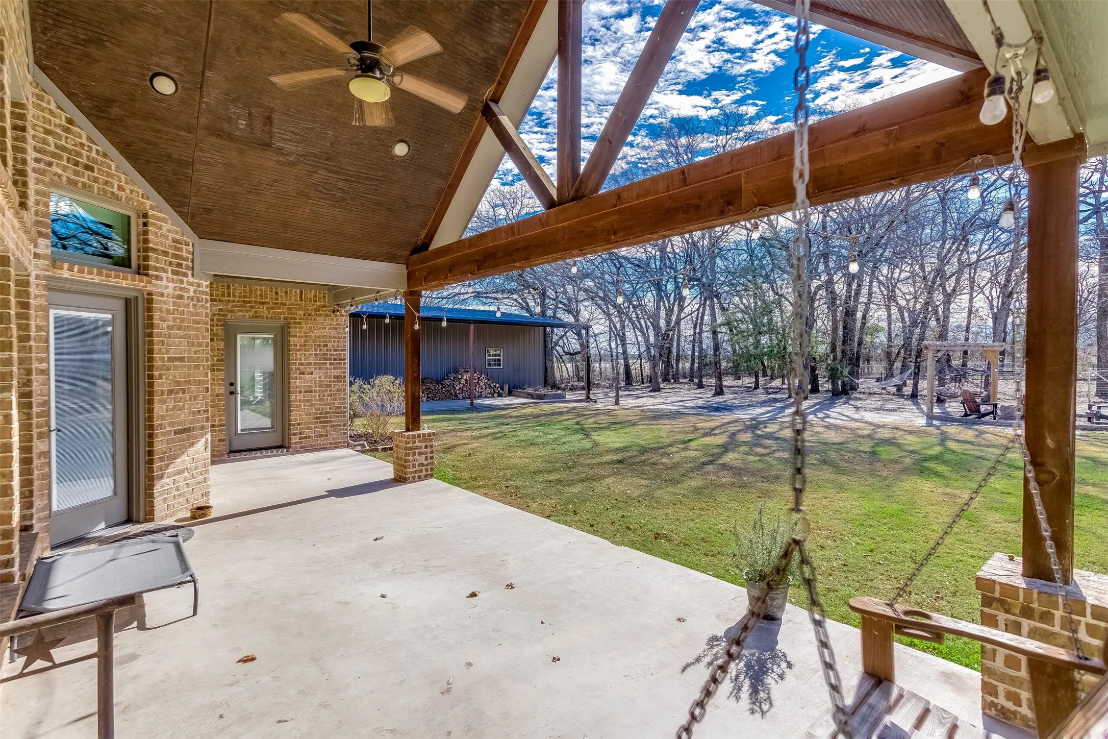 View of patio / terrace with a ceiling fan