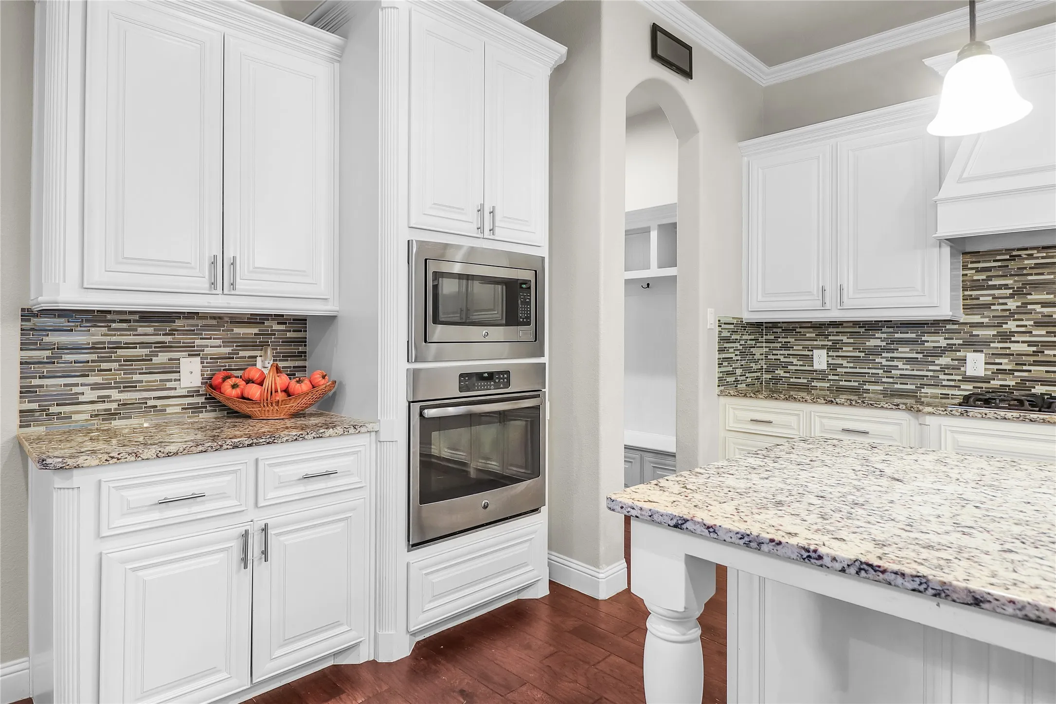 oven and microwave. mud room to right of oven