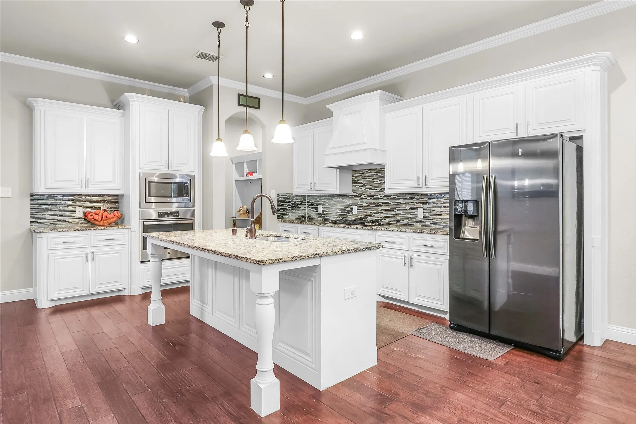 Kitchen is open and bright.